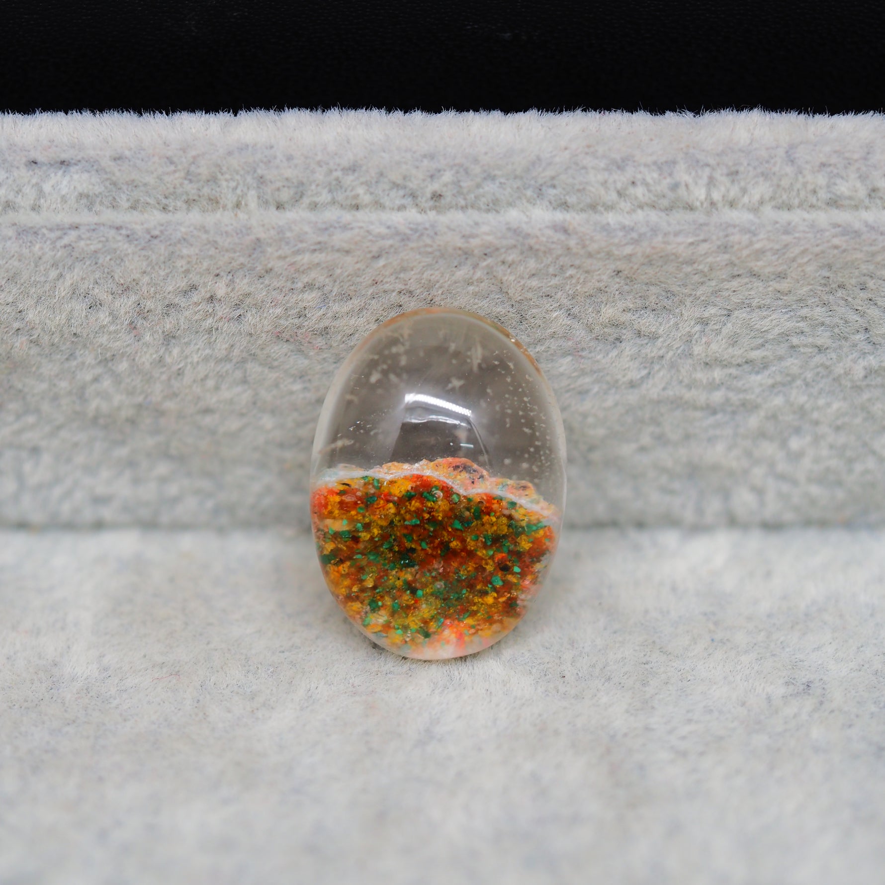 Garden quartz drill fill cabochon 22x16mm oval top view coin size comparison