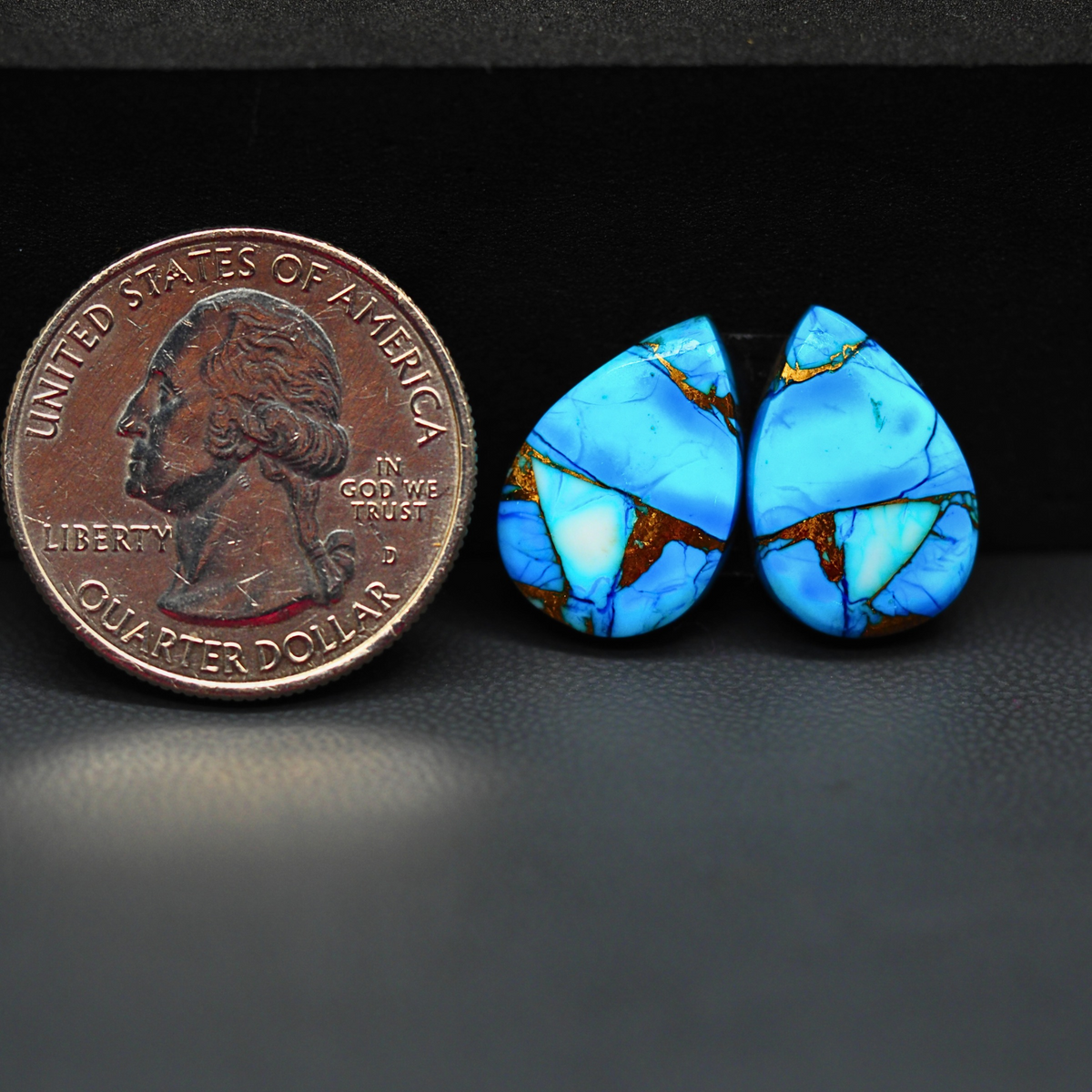 Kingman Ice Blue Dahlia Pear Cabochon Pair 17x12x3mm 12.5ct - icy blue and white stone with copper veining - Pedra Gems