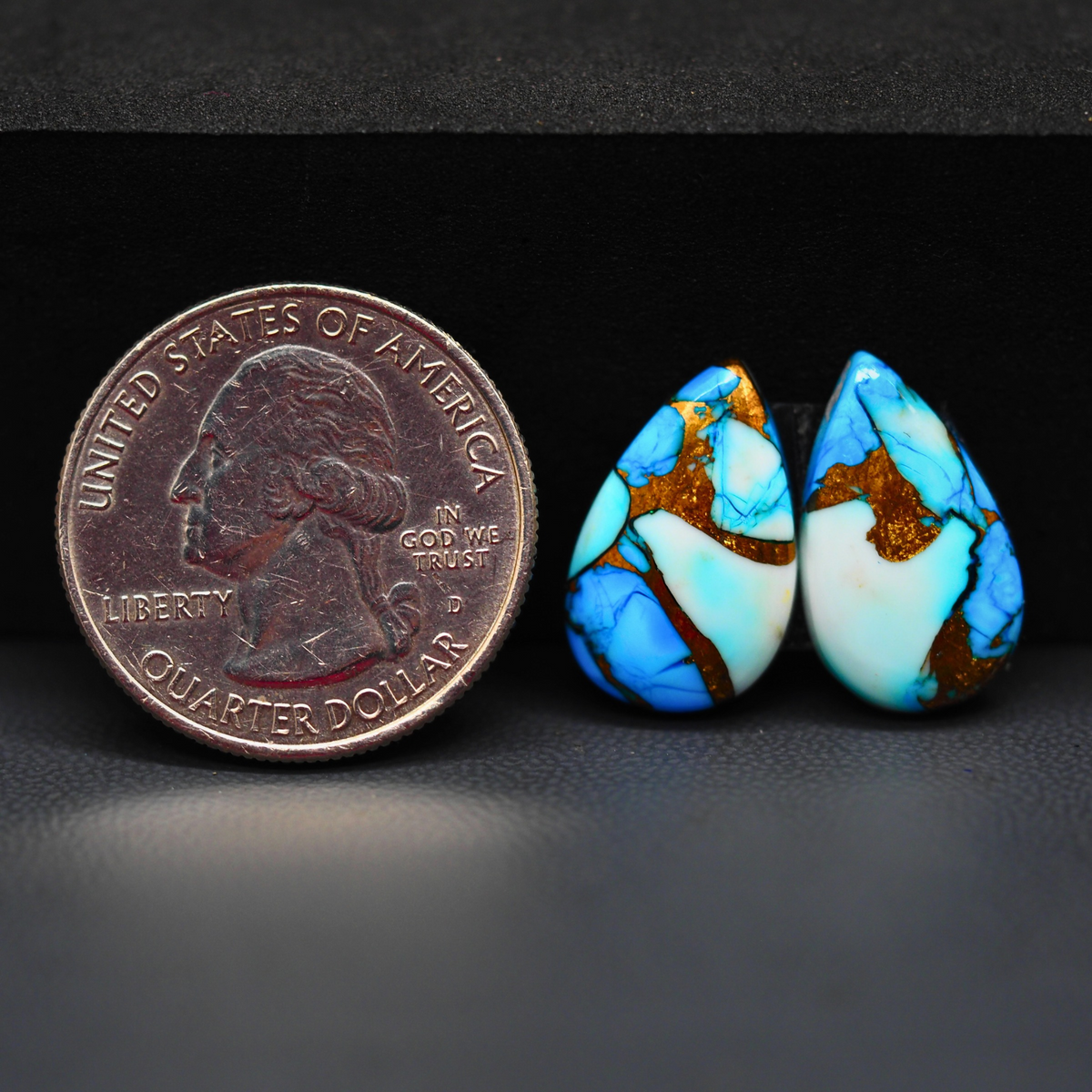 Kingman Ice Blue Dahlia Pear Cabochon Pair 18x11x3mm 11.5ct - icy blue and white stone with copper veining - Pedra Gems