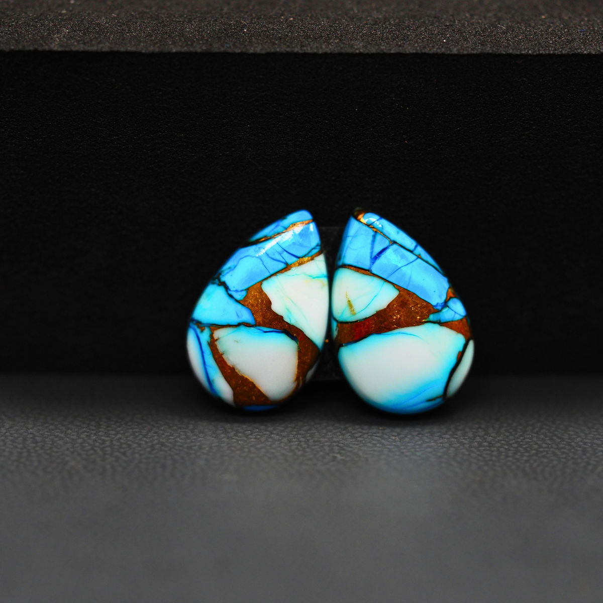 Kingman Ice Blue Dahlia Composite Pear Cabochon Pair 17x11x3mm 11.5ct - icy blue and white stone with copper veining - Pedra Gems