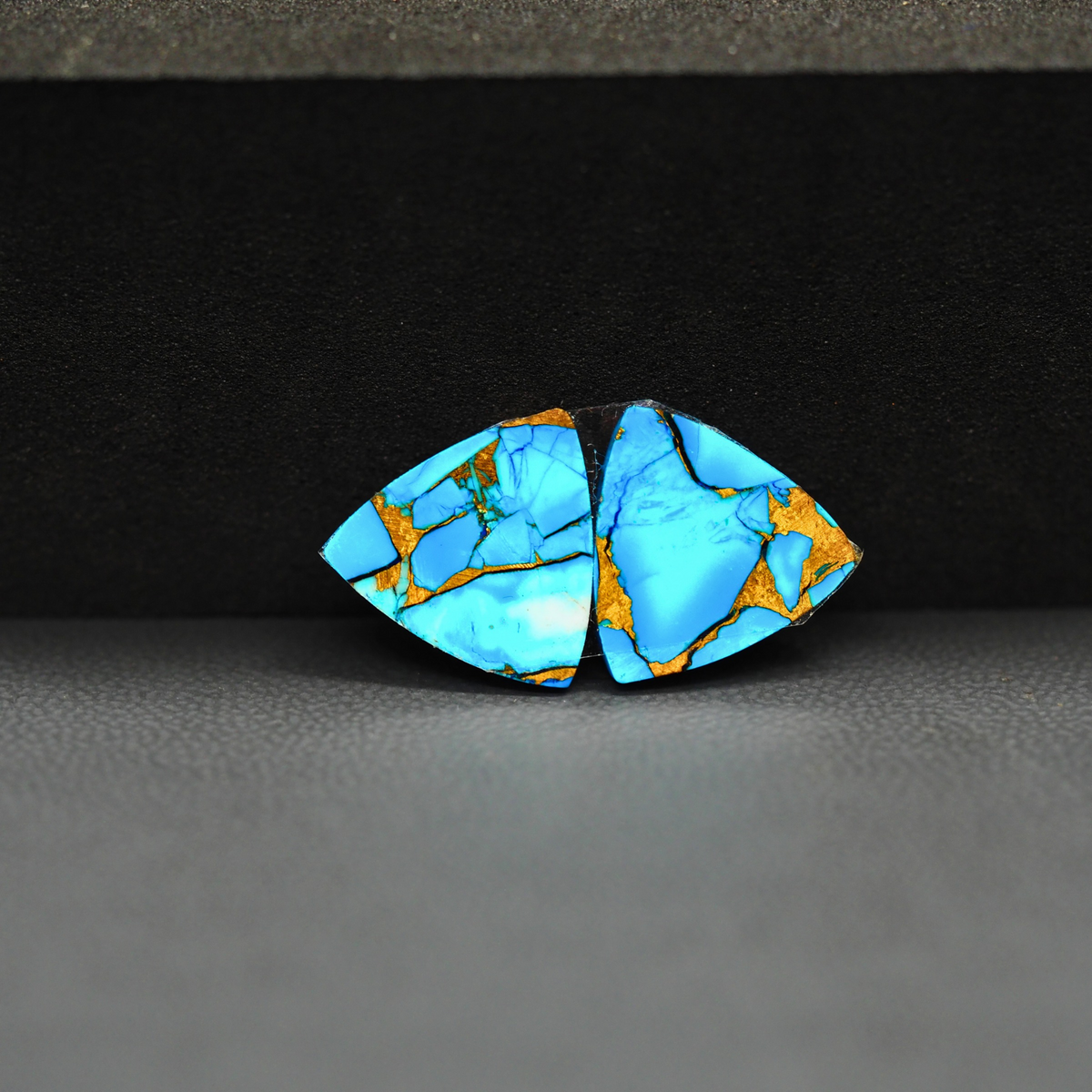 Kingman Ice Blue Dahlia Composite Trillion Cabochon Pair 13x11x3mm 9ct - icy blue and white stone with copper veining - Pedra Gems