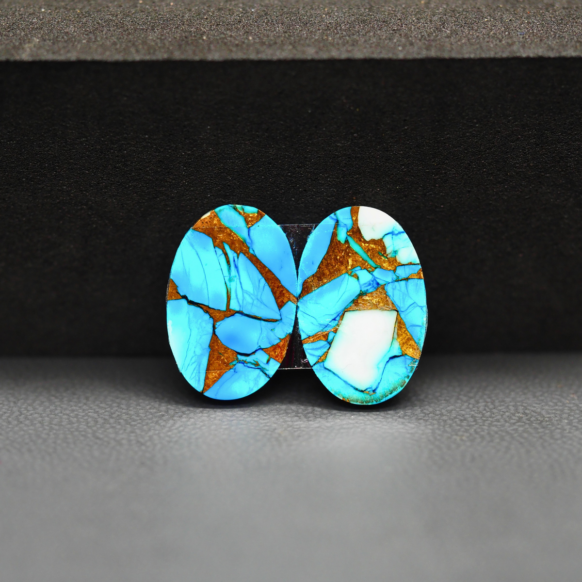 Kingman Ice Blue Dahlia Composite Oval Cabochon Pair 17x11x3mm 13ct - icy blue and white stone with copper veining - Pedra Gems