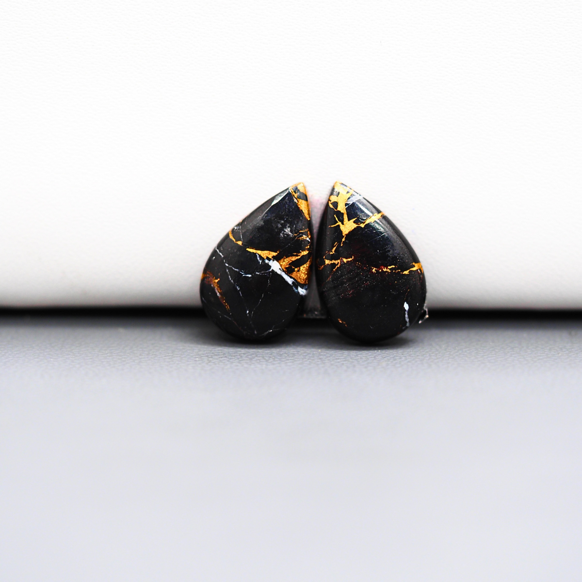 Kingman Black Buffalo Copper Composite Pear Cabochon Pair 14x11x3mm 10.5ct - black stone with bright copper veins - Pedra Gems