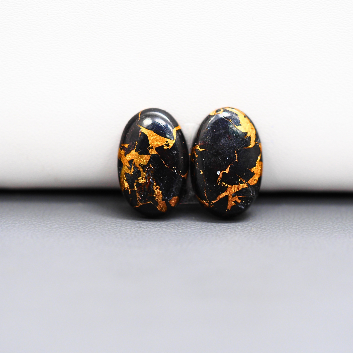 Kingman Black Buffalo Copper Composite Oval Cabochon Pair 16x11x4mm 13ct - black stone with bright copper veins - Pedra Gems
