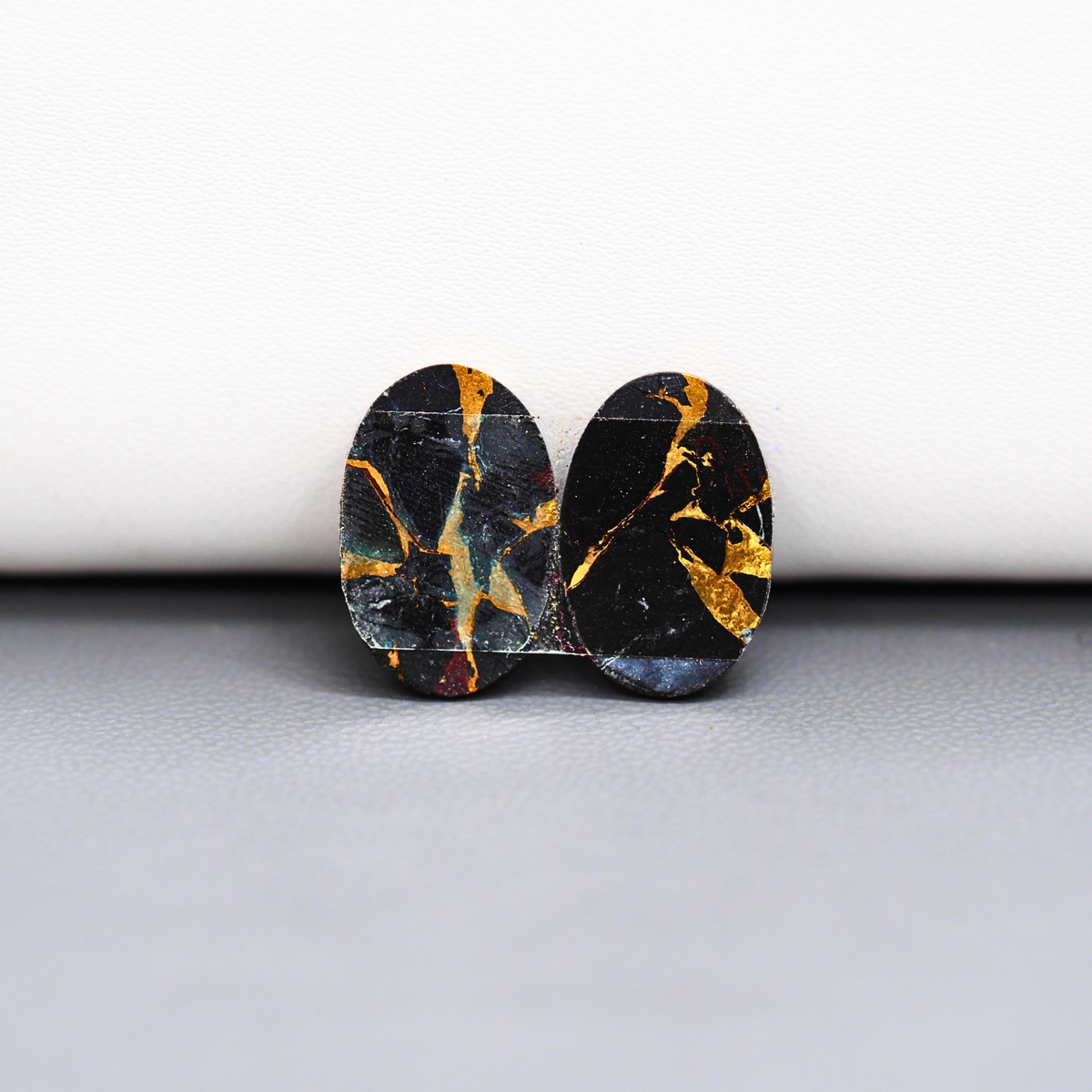 Kingman Black Buffalo Copper Composite Oval Cabochon Pair 16x11x4mm 13ct - black stone with bright copper veins - Pedra Gems