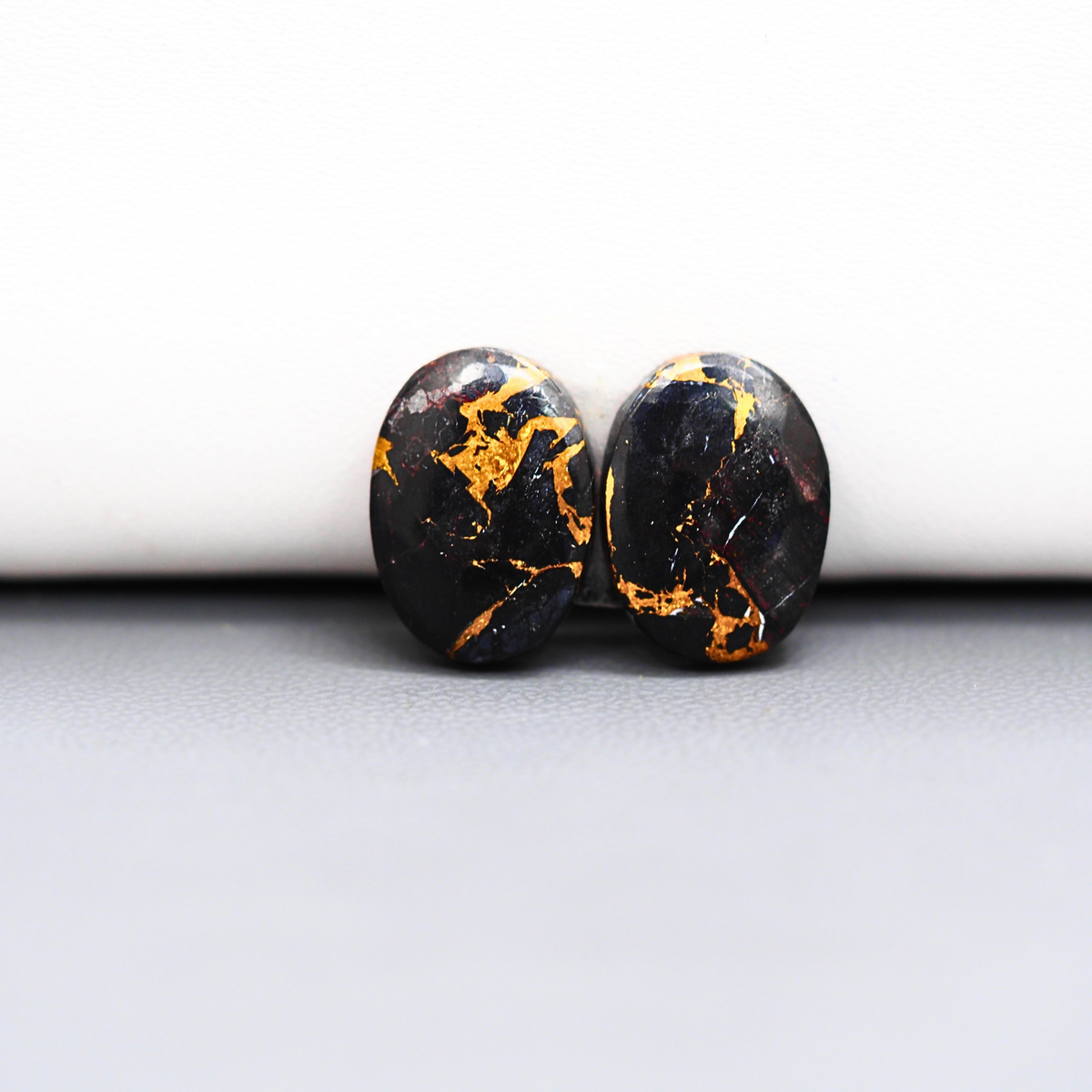 Kingman Black Buffalo Copper Composite Oval Cabochon Pair 15x11x3mm 10.5ct - black stone with bright copper veins - Pedra Gems