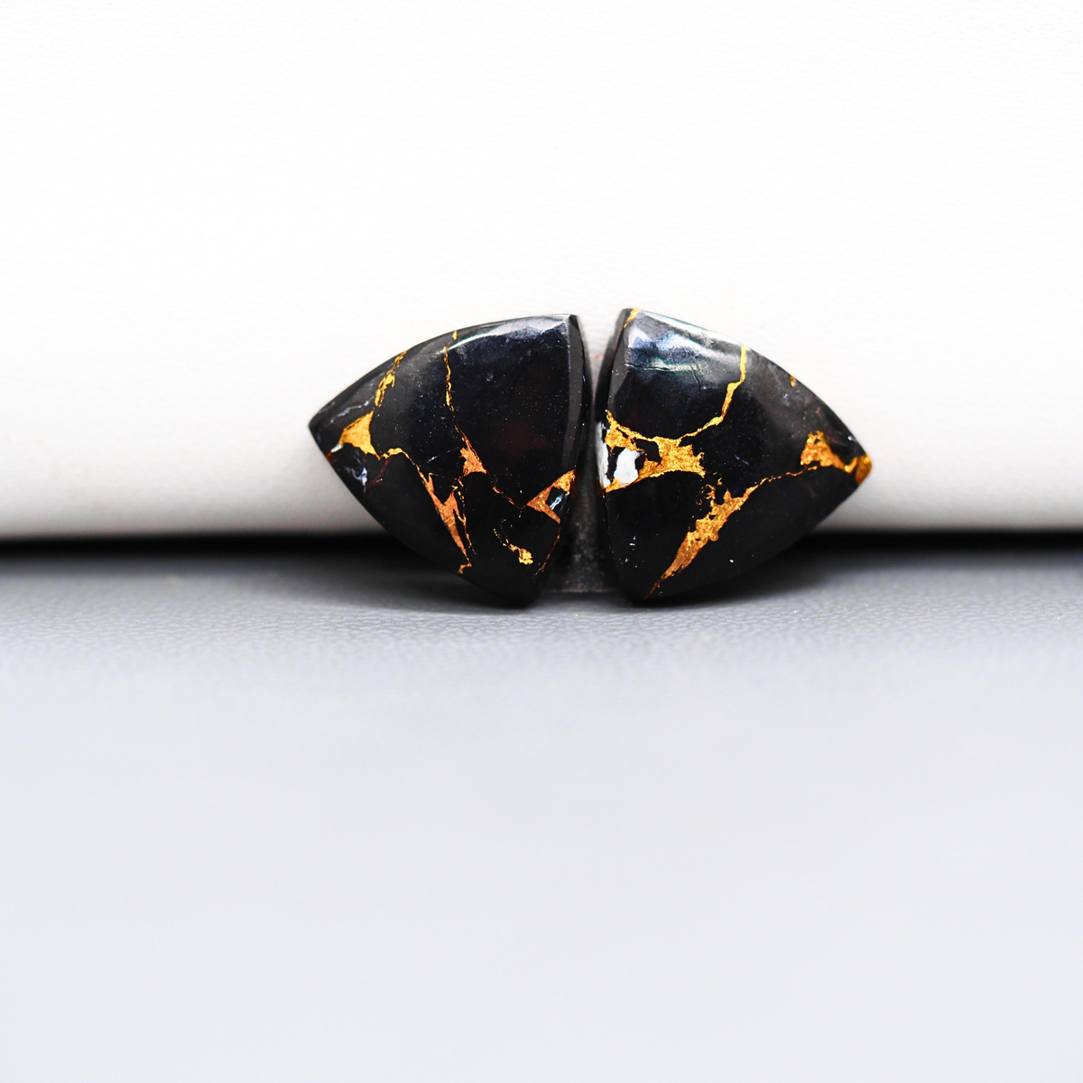 Kingman Black Buffalo Copper Composite Trillion Cabochon Pair 24x14x4mm 11.5ct - black stone with bright copper veins - Pedra Gems