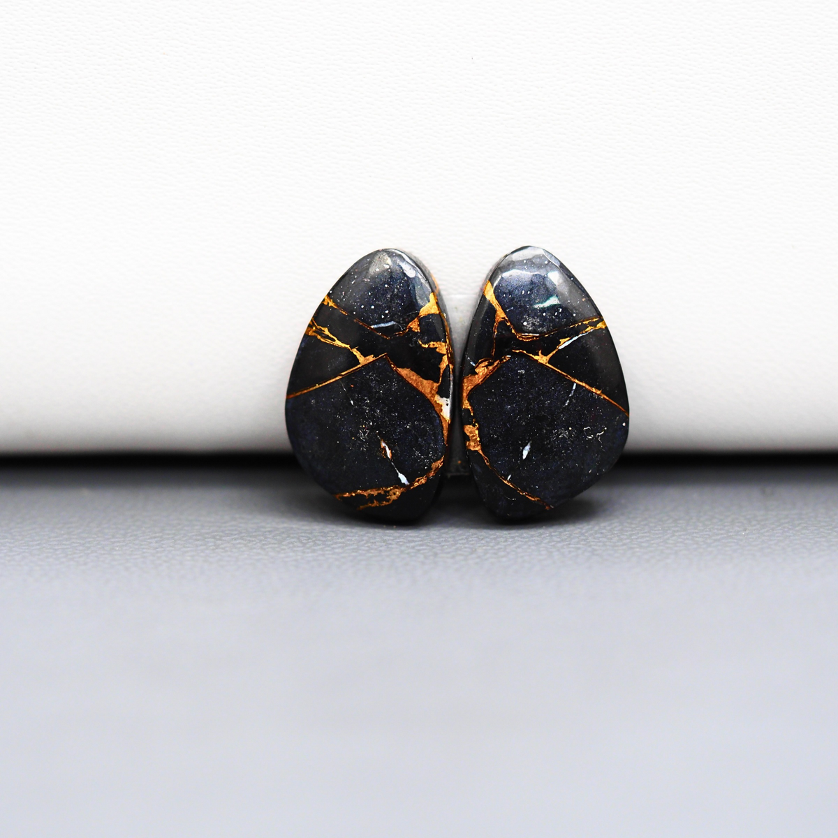 Kingman Black Buffalo Copper Composite Freeform Cabochon Pair 18x11x4mm 14ct - black stone with bright copper veins - Pedra Gems