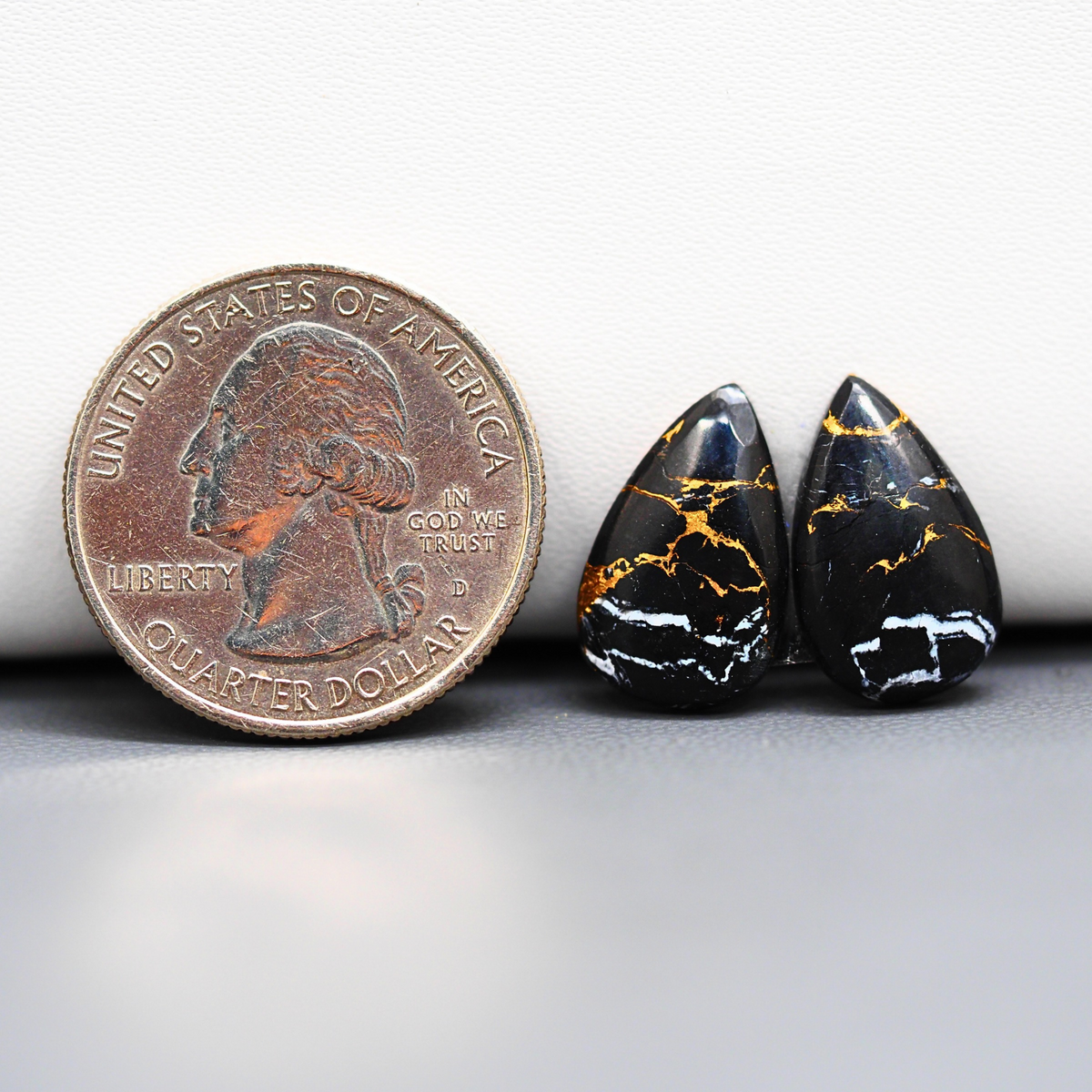 Kingman Black Buffalo Copper Composite Pear Cabochon Pair 17x10x3mm 8ct - black stone with bright copper veins - Pedra Gems