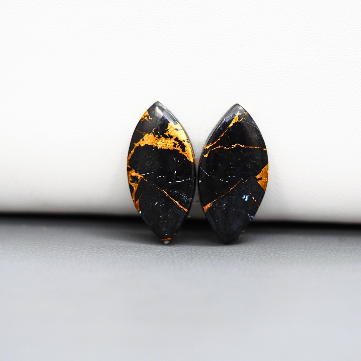 Kingman Black Buffalo Copper Composite Marquise Cabochon Pair 22x11x3mm 10.5ct - black stone with bright copper veins - Pedra Gems