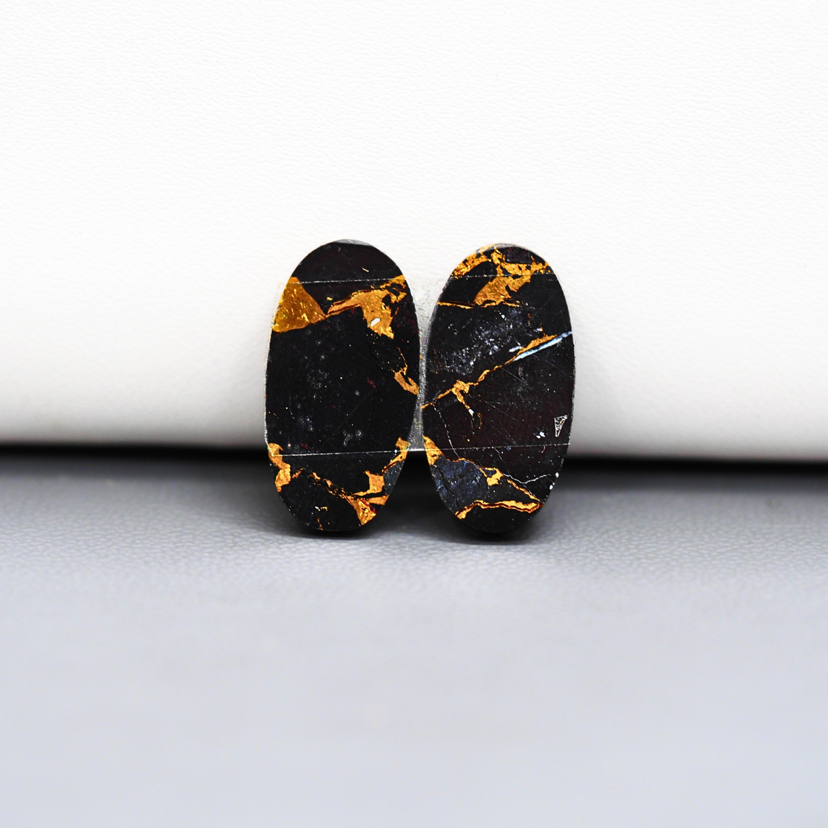 Kingman Black Buffalo Copper Composite Oval Cabochon Pair 19x10x3mm 13.5ct - black stone with bright copper veins - Pedra Gems