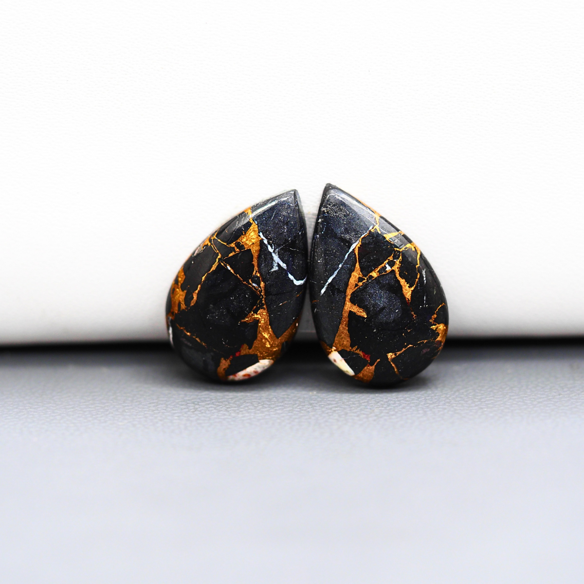 Kingman Black Buffalo Copper Composite Pear Cabochon Pair 20x13x3mm 16ct - black stone with bright copper veins - Pedra Gems