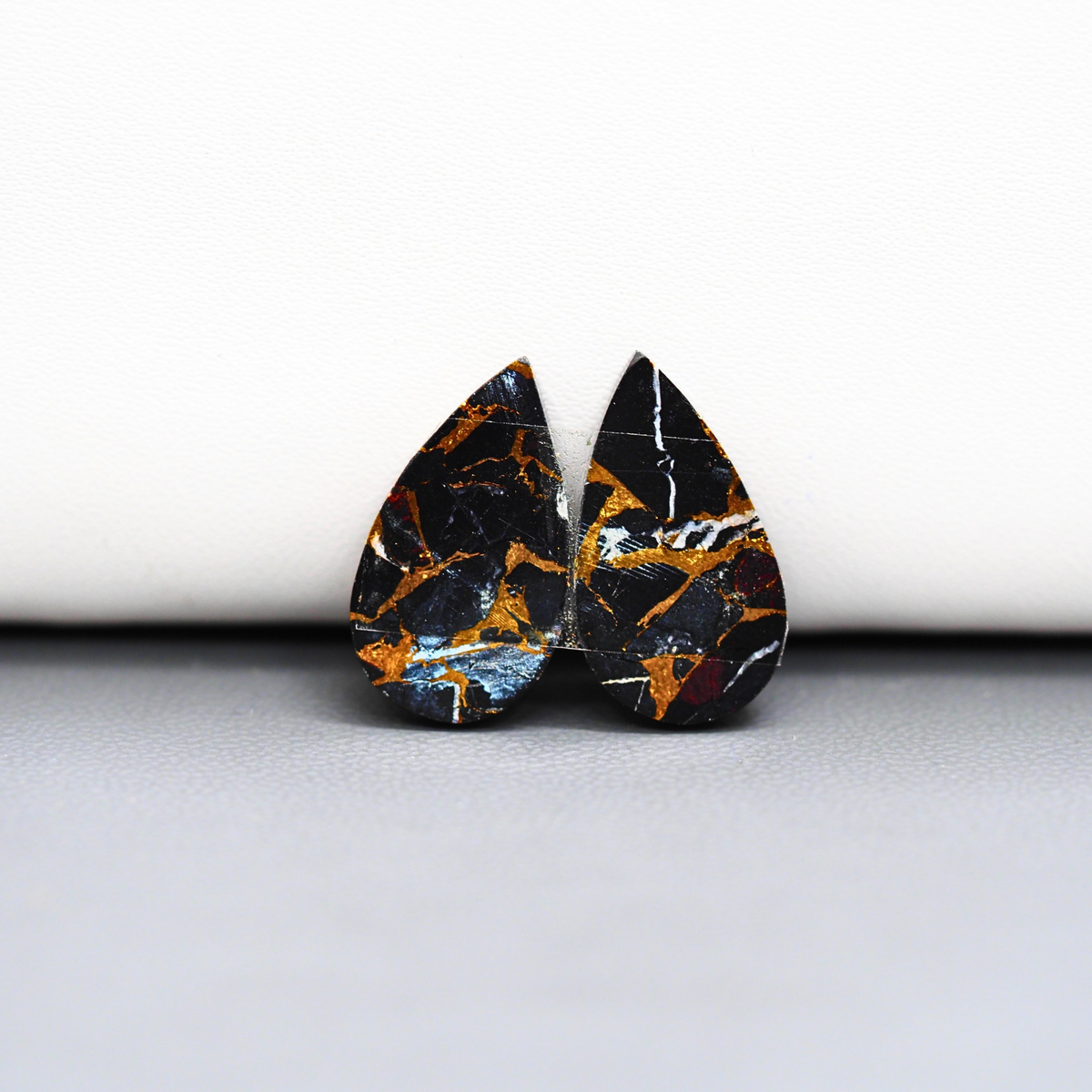 Kingman Black Buffalo Copper Composite Pear Cabochon Pair 16x11x3mm 13.5ct - black stone with bright copper veins - Pedra Gems