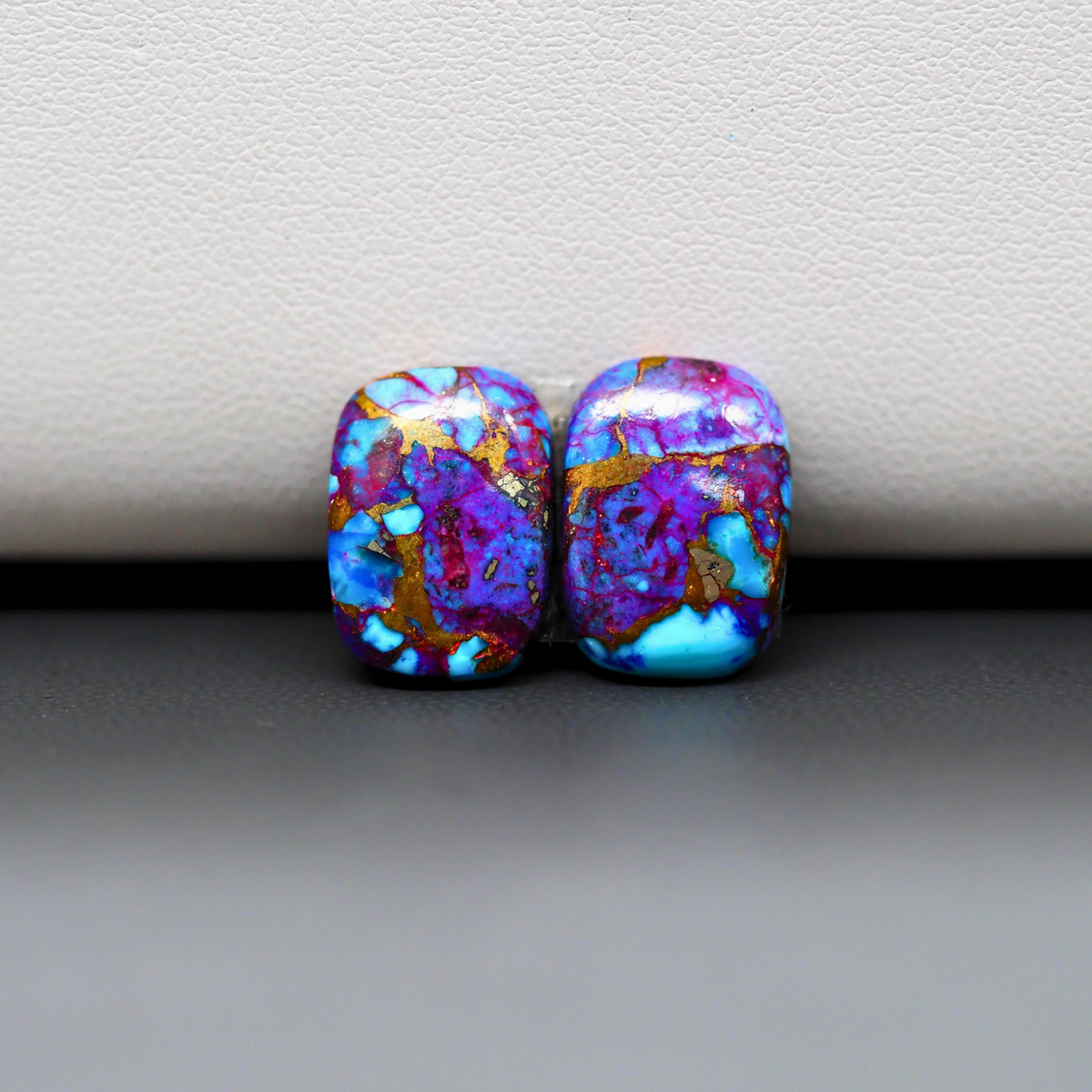 Stabilized Purple Mohave (Mojave) Turquoise cushion cabochon pair 14x10x3mm 10.5ct - purple with blue Kingman turquoise nuggets - photo 2 - Pedra Gems.