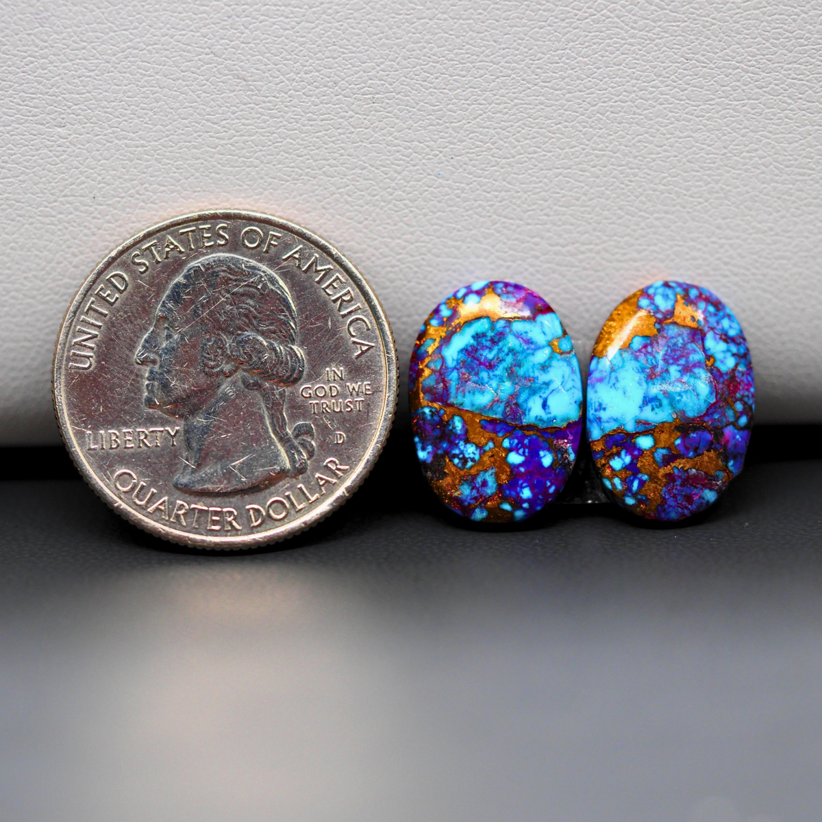 Stabilized Purple Mohave (Mojave) Turquoise oval cabochon pair 17x12x3mm 14ct - purple with blue Kingman turquoise nuggets - photo 1 - Pedra Gems.
