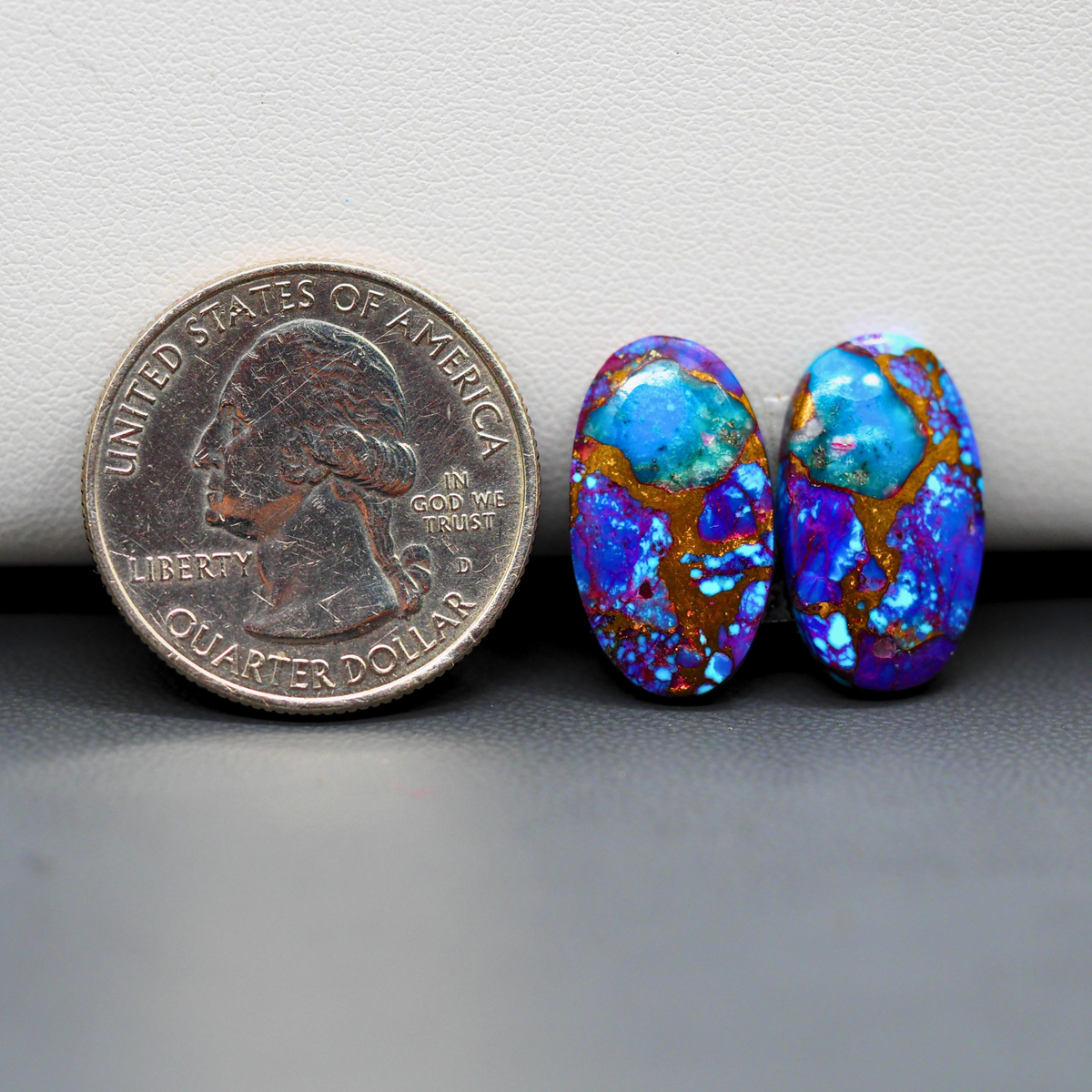 Stabilized Purple Mohave (Mojave) Turquoise oval cabochon pair 19x11x3mm 13ct - purple with blue Kingman turquoise nuggets - photo 1 - Pedra Gems.