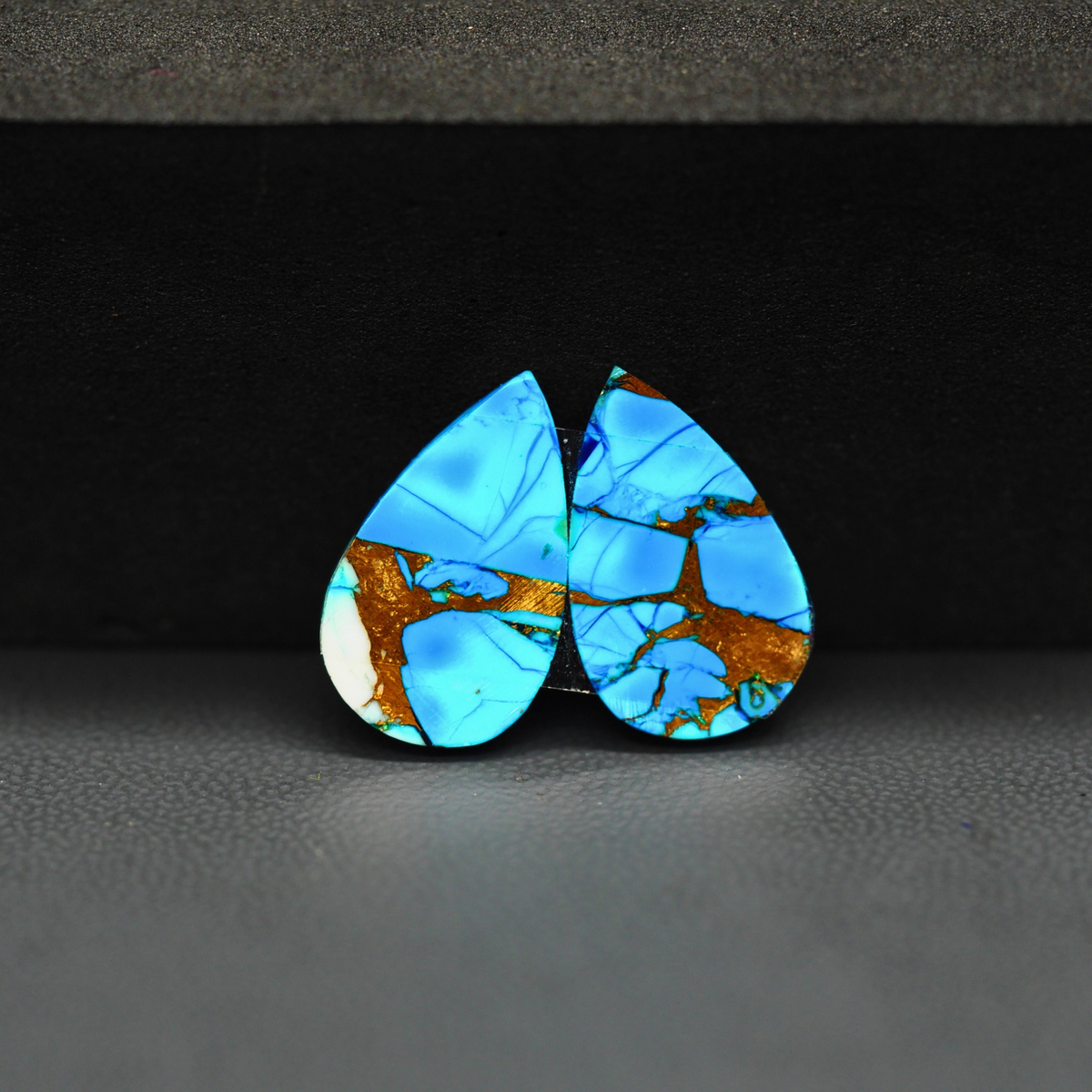 Kingman Ice Blue Dahlia Pear Cabochon Pair 17x11x3mm 10.5ct - icy blue and white stone with copper veining - Pedra Gems