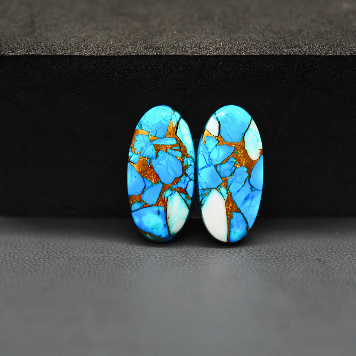 Kingman Ice Blue Dahlia Oval Cabochon Pair 21x11x3mm 15.5ct - icy blue and white stone with copper veining - Pedra Gems