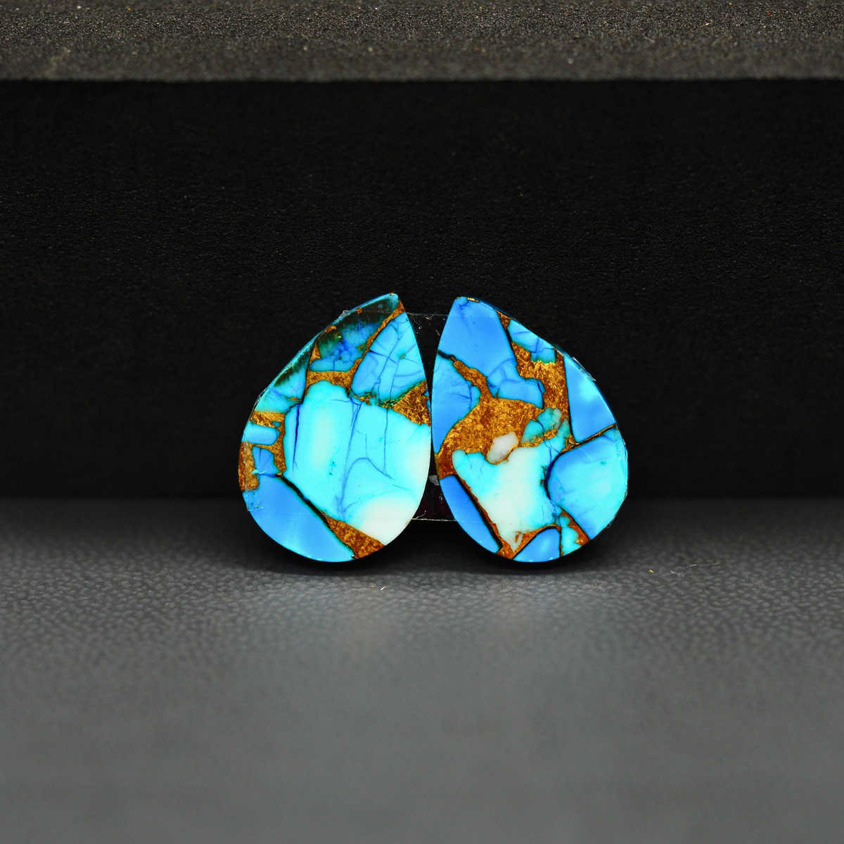 Kingman Ice Blue Dahlia Composite Pear Cabochon Pair 17x12x3mm 12.5ct - icy blue and white stone with copper veining - Pedra Gems
