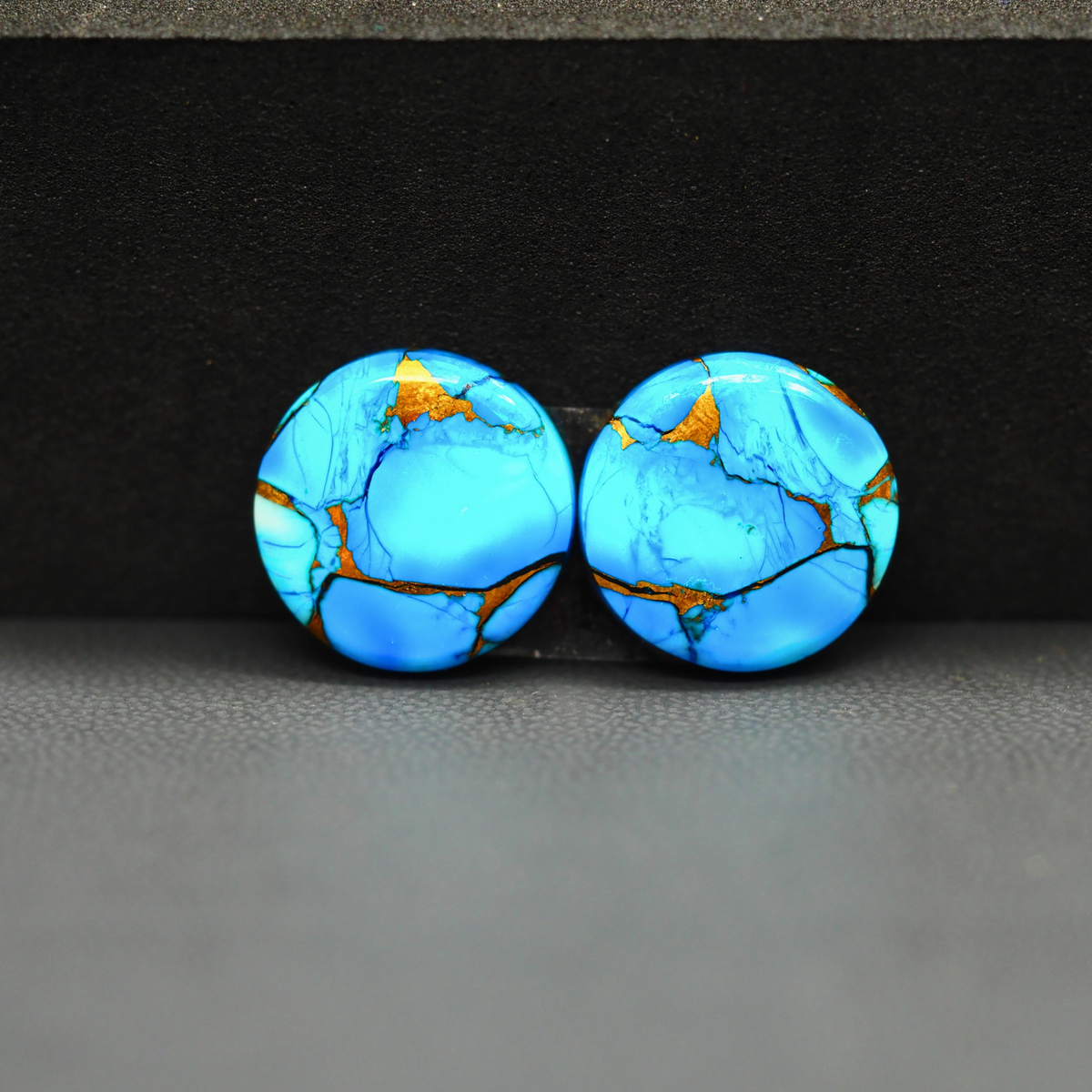 Kingman Ice Blue Dahlia Composite Round Cabochon Pair 15x15x3mm 14ct - icy blue and white stone with copper veining - Pedra Gems