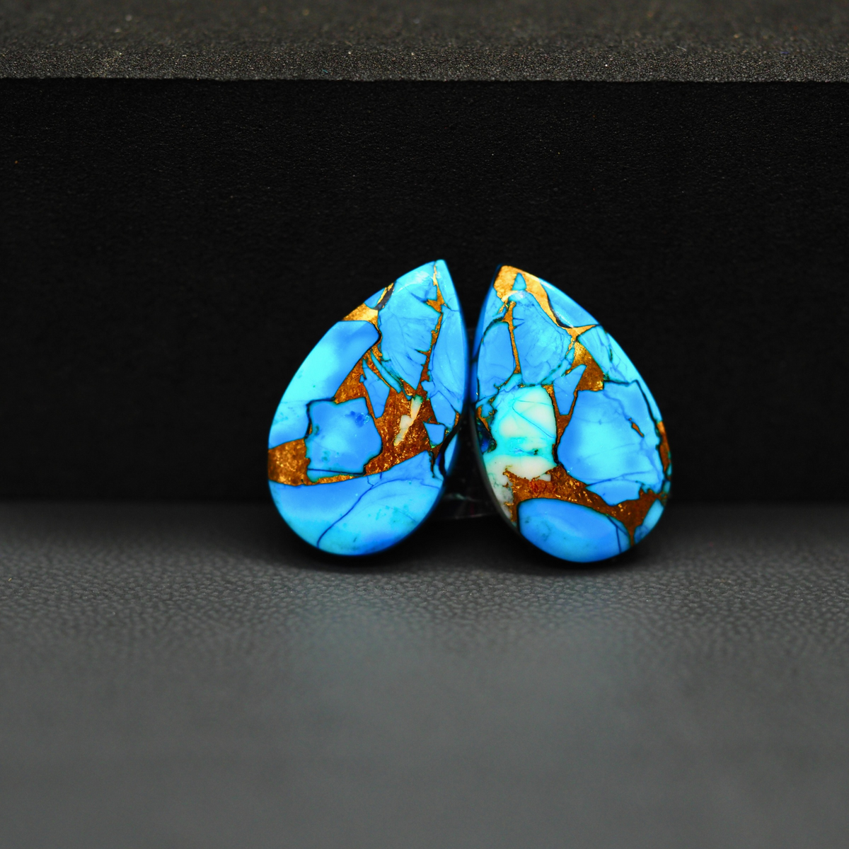 Kingman Ice Blue Dahlia Composite Pear Cabochon Pair 19x12x3mm 15ct - icy blue and white stone with copper veining - Pedra Gems