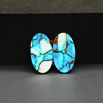 Kingman Ice Blue Dahlia Composite Oval Cabochon Pair 20x11x3mm 14ct - icy blue and white stone with copper veining - Pedra Gems