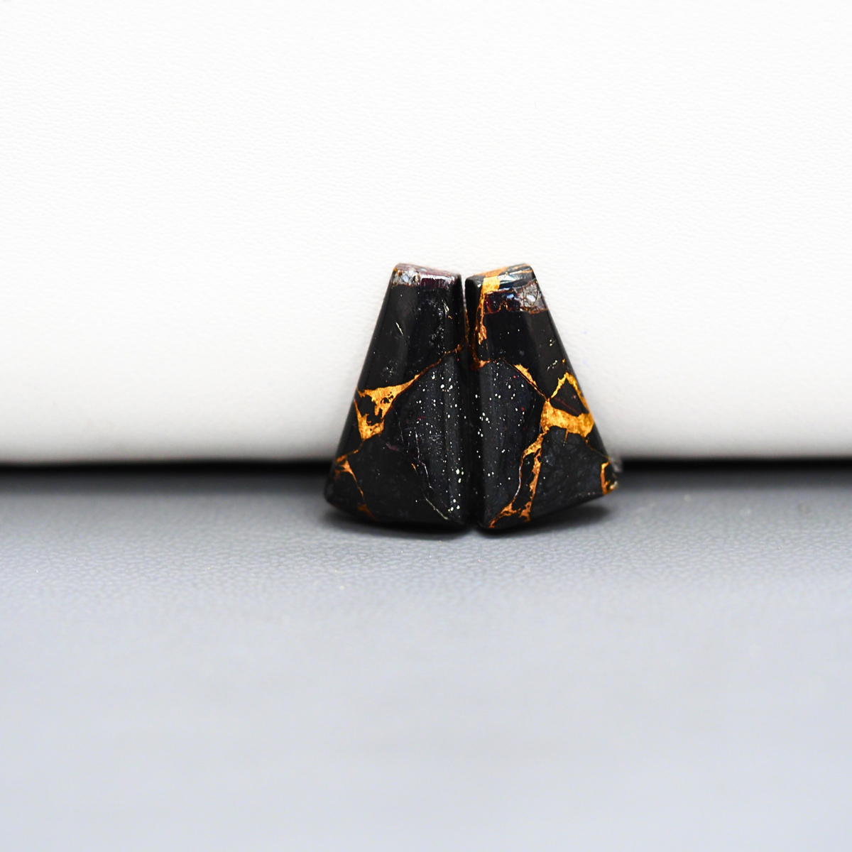 Kingman Black Buffalo Copper Composite Trapezoid Cabochon Pair 18x10x3mm 11ct - black stone with bright copper veins - Pedra Gems