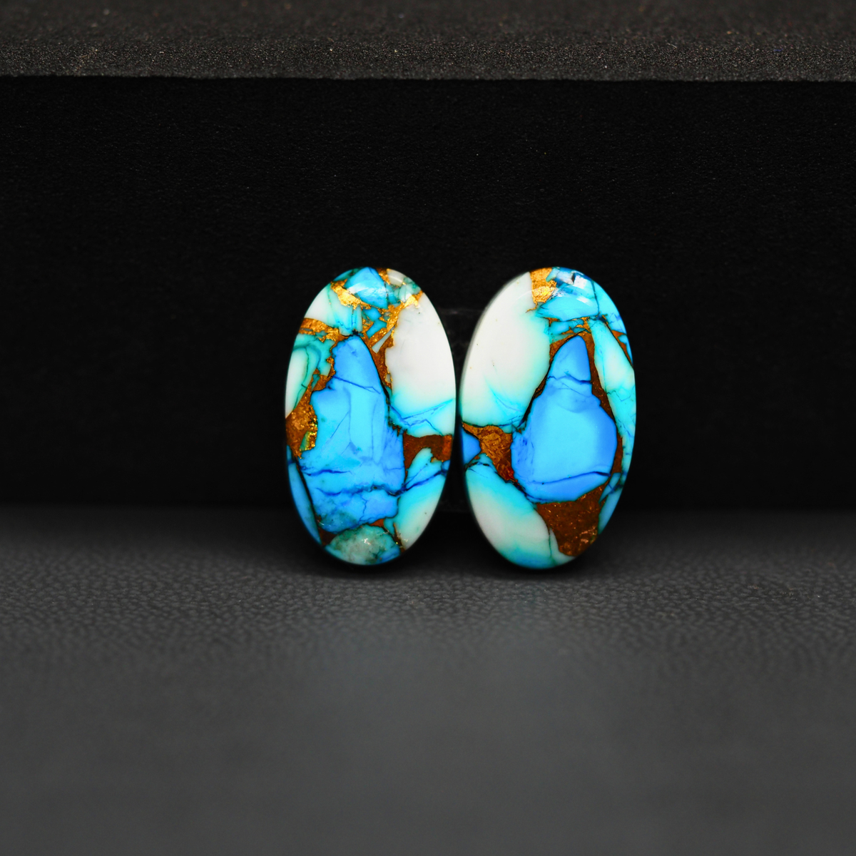 Kingman Ice Blue Dahlia Composite Oval Cabochon Pair 18x11x3mm 12.5ct - icy blue and white stone with copper veining - Pedra Gems