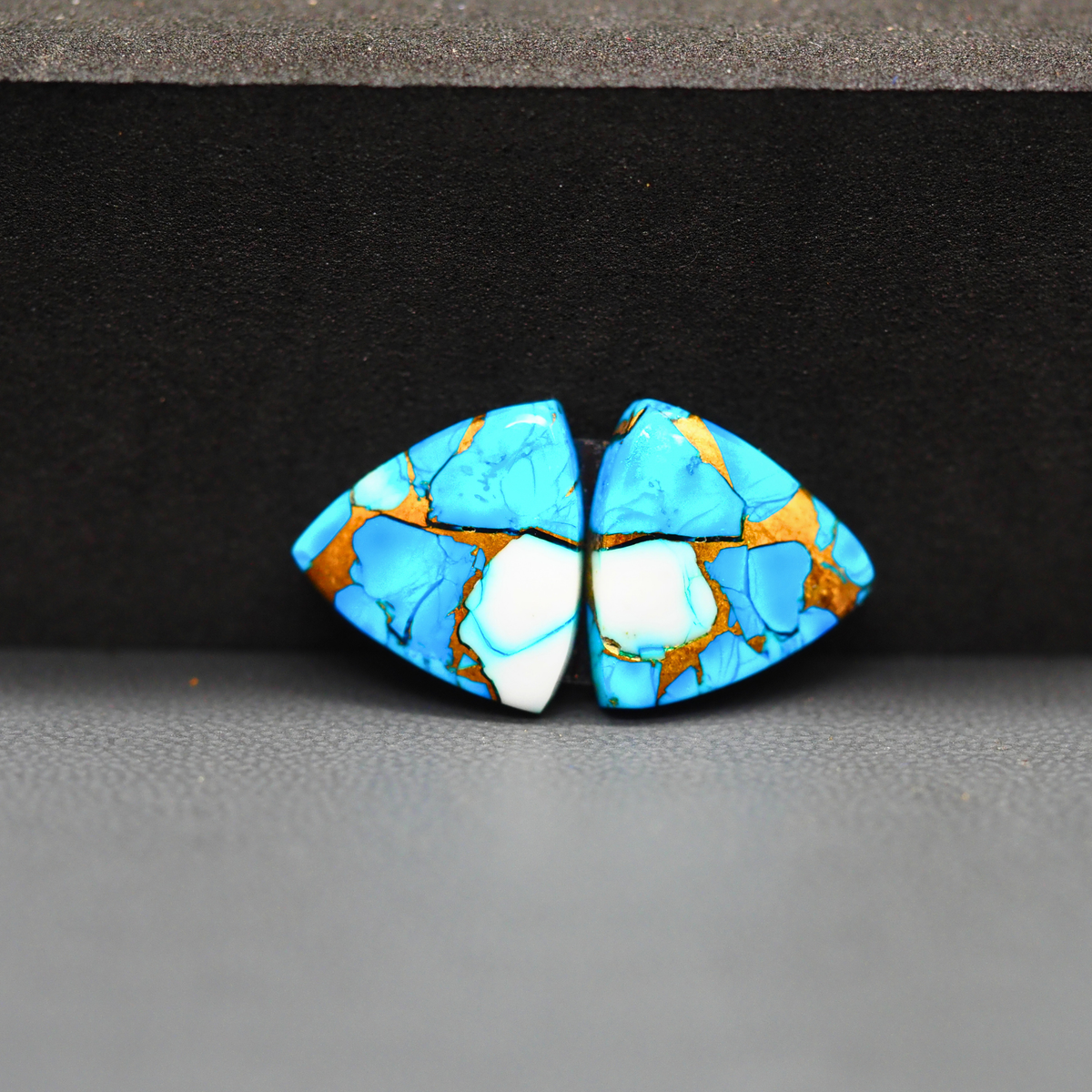 Kingman Ice Blue Dahlia Composite Trillion Cabochon Pair 14x14x3mm 12ct - icy blue and white stone with copper veining - Pedra Gems