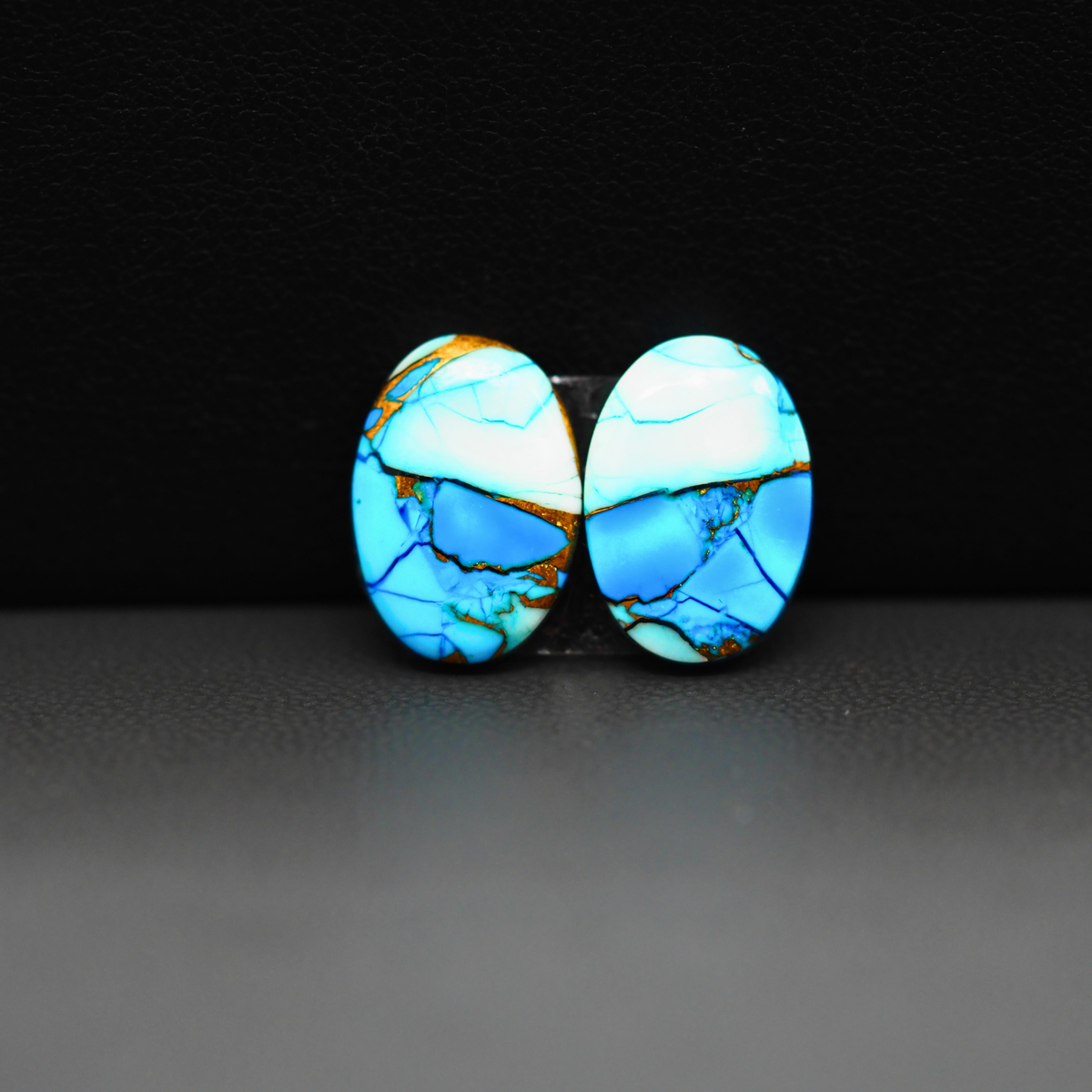 Kingman Ice Blue Dahlia Composite Oval Cabochon Pair 14x10x3mm 9.5ct - icy blue and white stone with copper veining - Pedra Gems