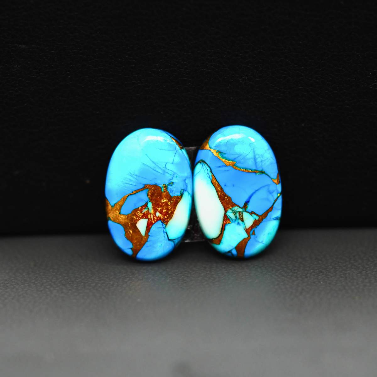 Kingman Ice Blue Dahlia Composite Oval Cabochon Pair 16x11x3mm 10.5ct - icy blue and white stone with copper veining - Pedra Gems