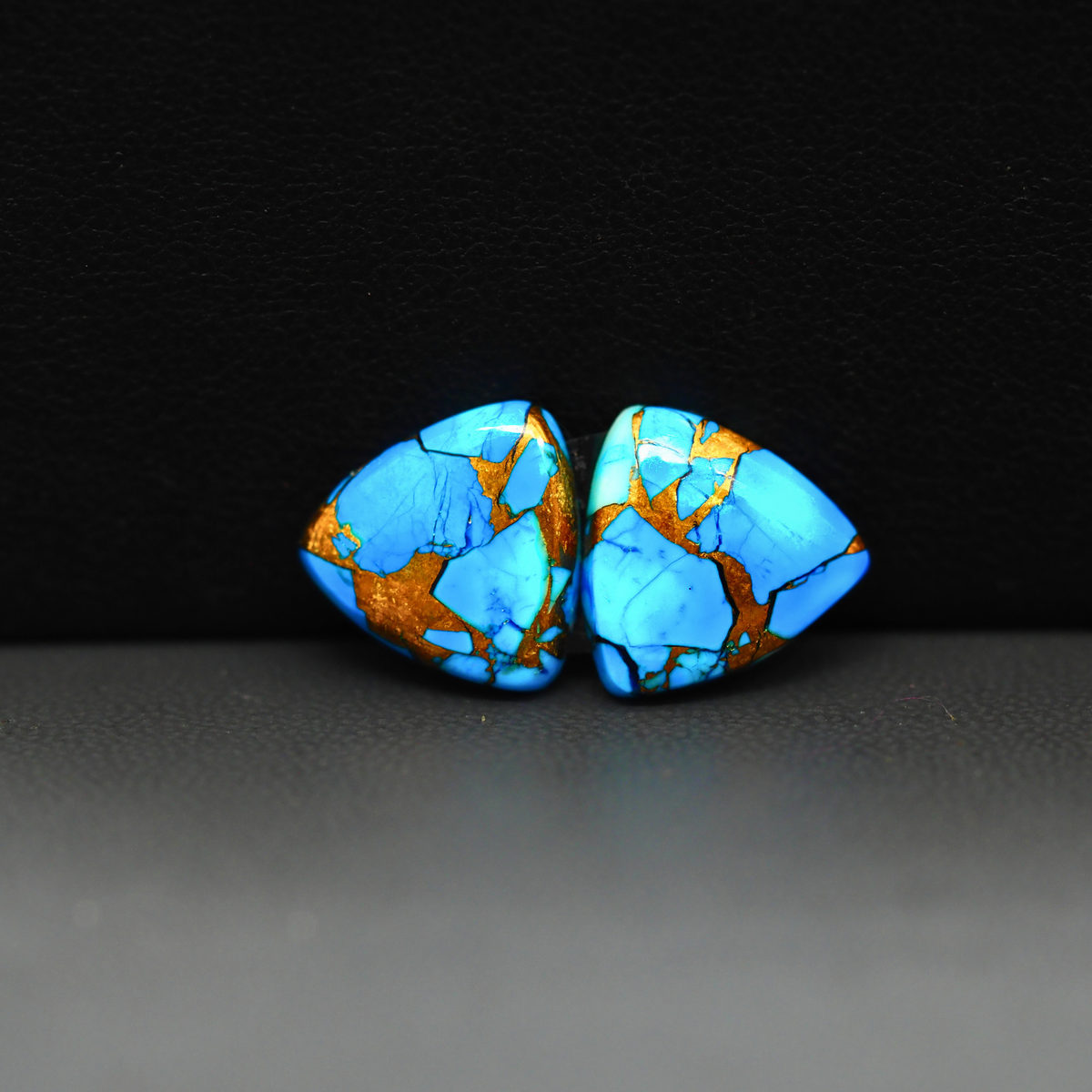 Kingman Ice Blue Dahlia Composite Trillion Cabochon Pair 13x13x3mm 10ct - icy blue and white stone with copper veining - Pedra Gems