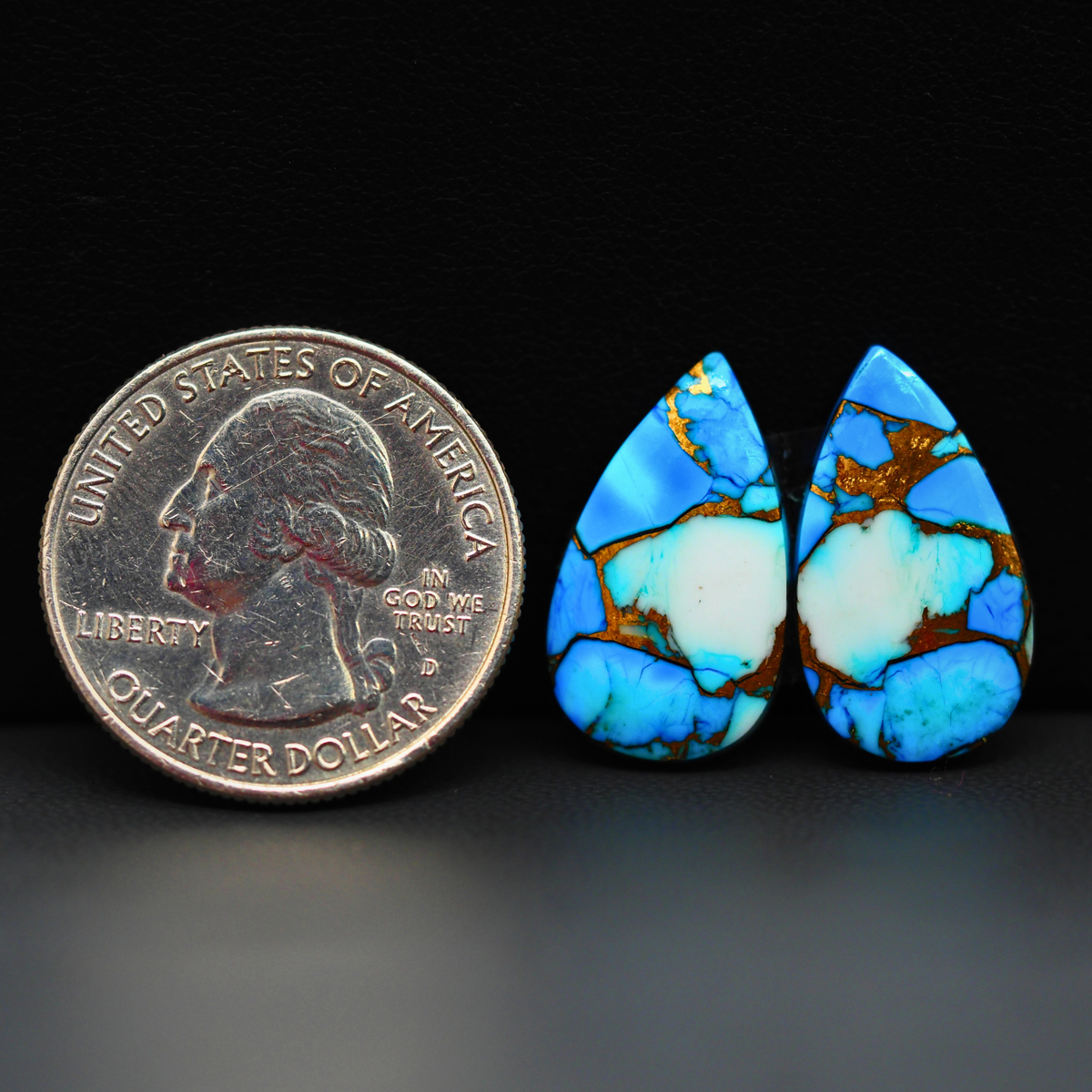 Kingman Ice Blue Dahlia Composite Pear Cabochon Pair 21x12x3mm 14ct - icy blue and white stone with copper veining - Pedra Gems