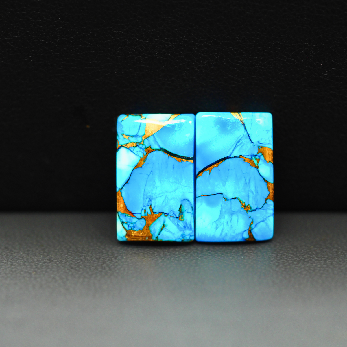 Kingman Ice Blue Dahlia Composite Rectangle Cabochon Pair 17x11x3mm 15ct - icy blue and white stone with copper veining - Pedra Gems