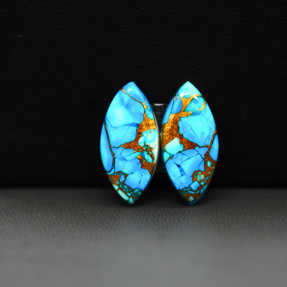 Kingman Ice Blue Dahlia Composite Marquise Cabochon Pair 21x10x3mm 13ct - icy blue and white stone with copper veining - Pedra Gems