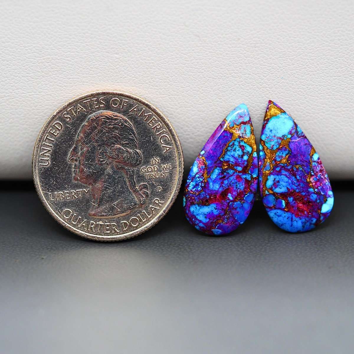 Stabilized Purple Mohave (Mojave) Turquoise pear cabochon pair 21x11x3mm 10.5ct - purple with blue Kingman turquoise nuggets - photo 1 - Pedra Gems.