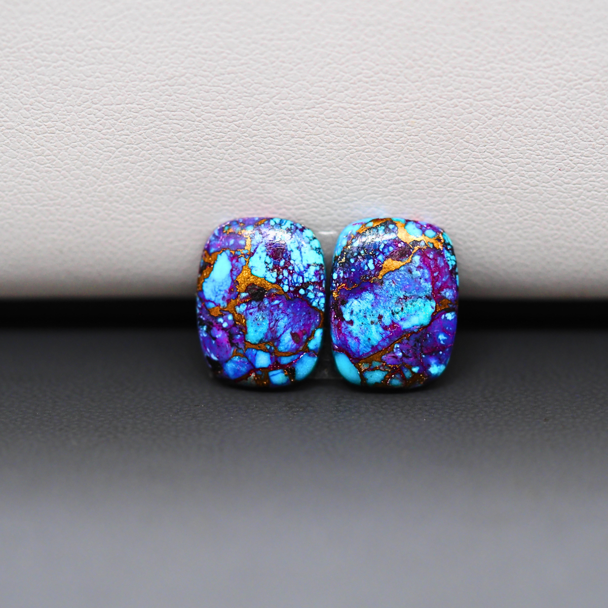 Stabilized Purple Mohave (Mojave) Turquoise cushion cabochon pair 14x11x3mm 9.5ct - purple with blue Kingman turquoise nuggets - photo 2 - Pedra Gems.