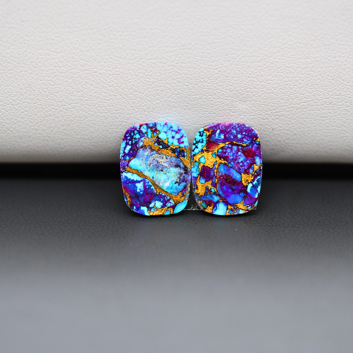 Stabilized Purple Mohave (Mojave) Turquoise cushion cabochon pair 14x11x3mm 9.5ct - purple with blue Kingman turquoise nuggets - photo 3 - Pedra Gems.
