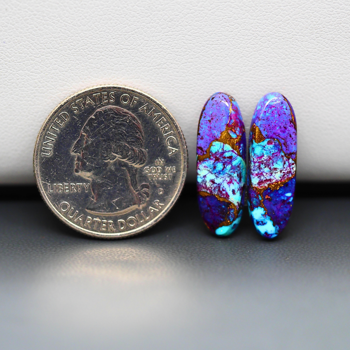 Stabilized Purple Mohave (Mojave) Turquoise oval cabochon pair 22x8x3mm 12.5ct - purple with blue Kingman turquoise nuggets - photo 1 - Pedra Gems.