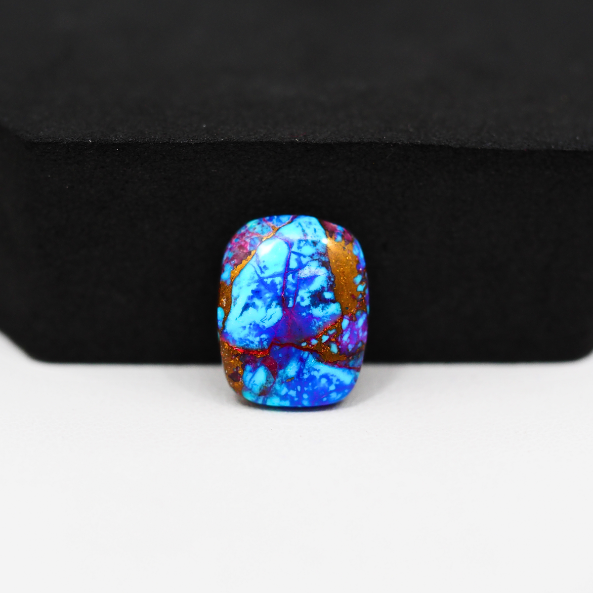 Stabilized Purple Mohave (Mojave) Turquoise Cushion Cabochon 15x12x3mm 6ct - purple with blue Kingman turquoise nuggets and bronze veining - Pedra Gems.
