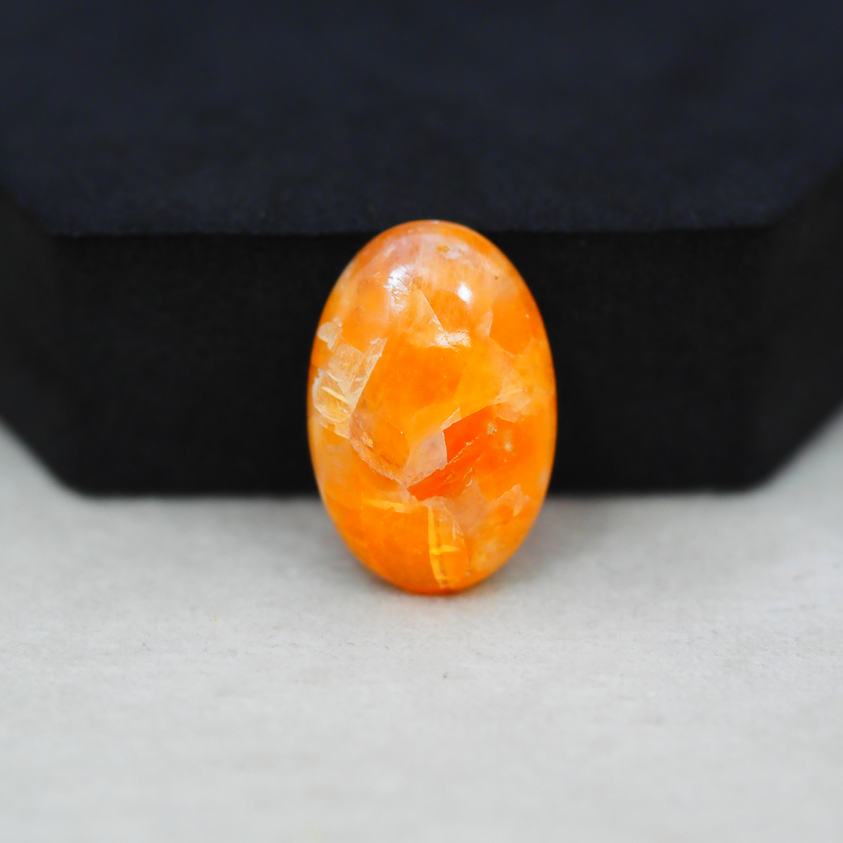 Natural Orange Calcite Oval Cabochon 24x16mm 18ct - warm honey-orange - Pedra Gems.