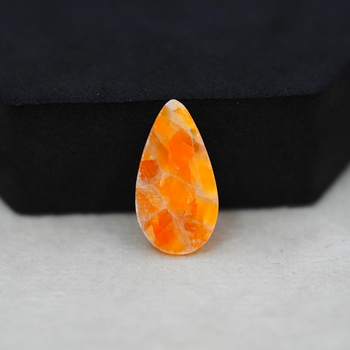 Natural Orange Calcite Pear Cabochon 23x12mm 10.5ct - warm honey-orange - Pedra Gems.