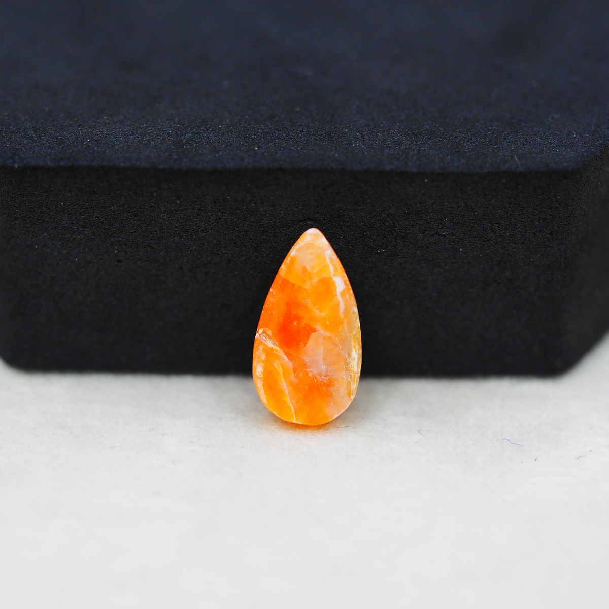 Natural Orange Calcite Pear Cabochon 16x9mm 4ct - warm honey-orange - Pedra Gems.