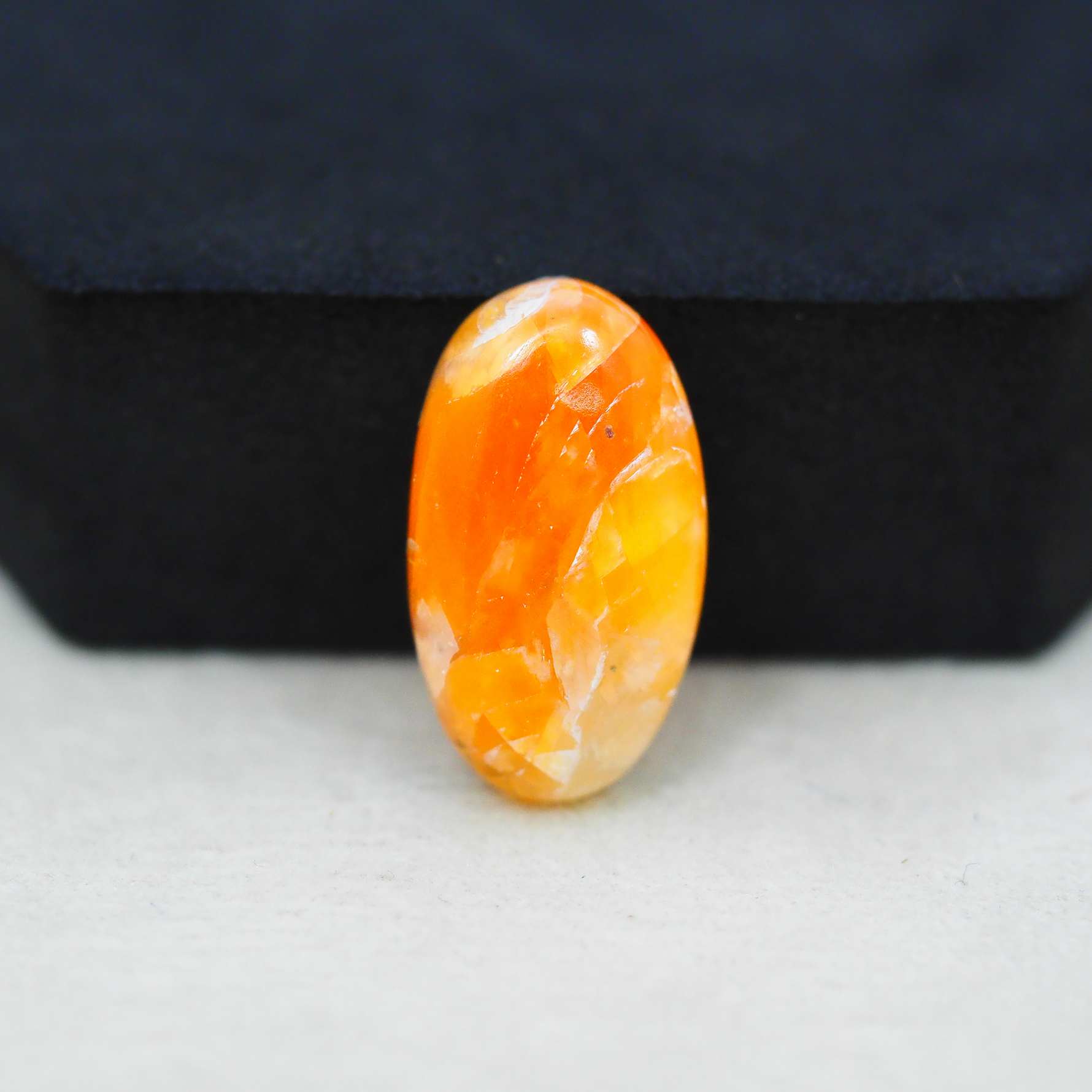Natural Orange Calcite Oval Cabochon 23x13mm 15ct - warm honey-orange - Pedra Gems.