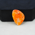 Natural Orange Calcite Trillion Cabochon 23x17mm 14ct - warm honey-orange - Pedra Gems.