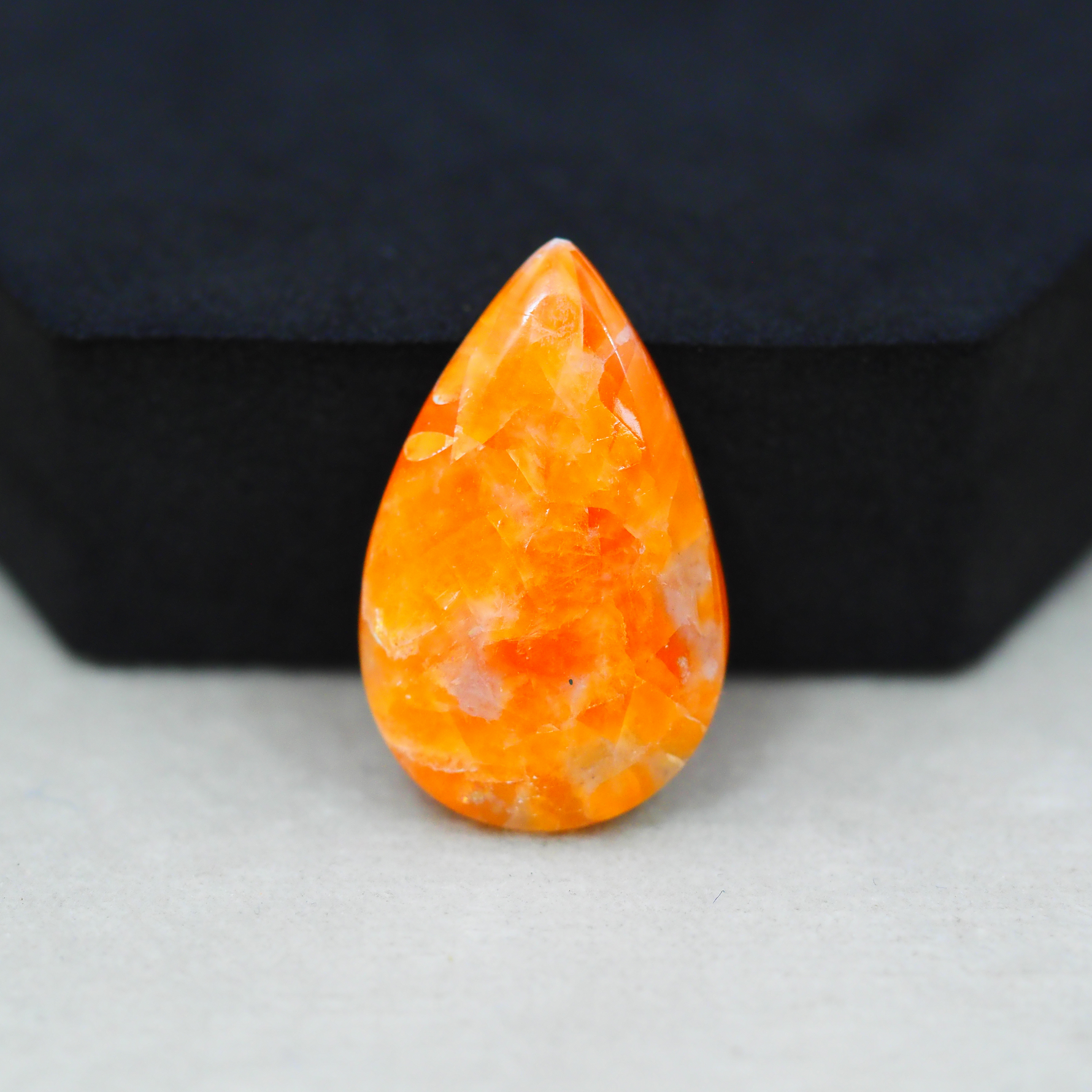 Natural Orange Calcite Pear Cabochon 29x18mm 18ct - warm honey-orange - Pedra Gems.