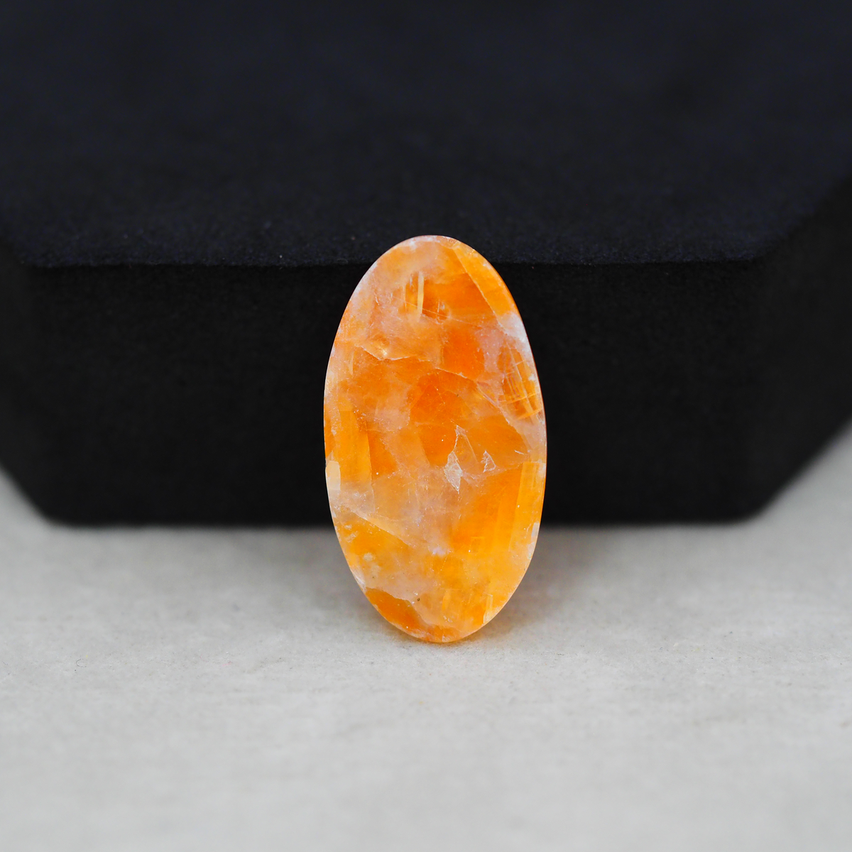 Natural Orange Calcite Oval Cabochon 25x13mm 15ct - warm honey-orange - Pedra Gems.