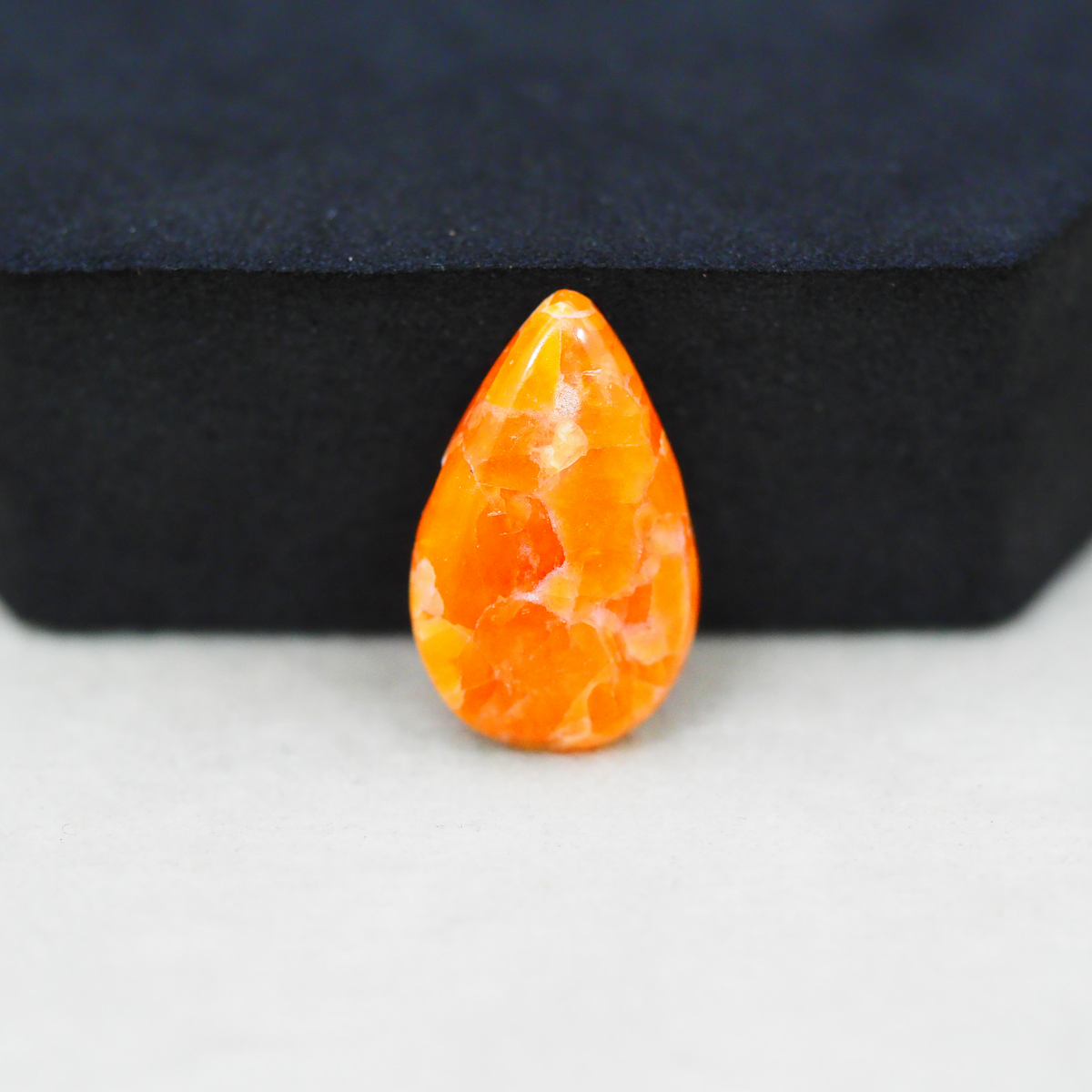 Natural Orange Calcite Pear Cabochon 21x13mm 9ct - warm honey-orange - Pedra Gems.