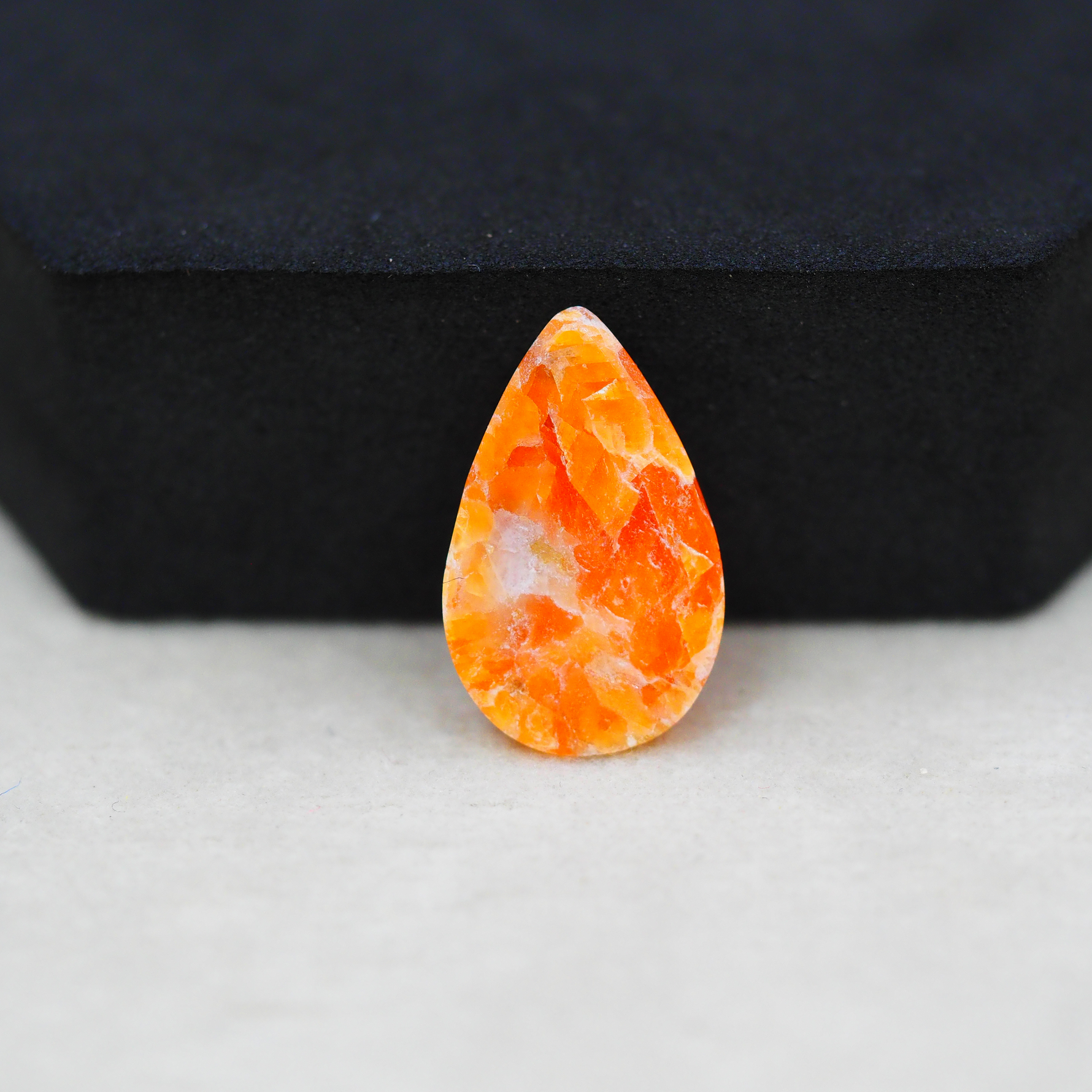 Natural Orange Calcite Pear Cabochon 21x13mm 9ct - warm honey-orange - Pedra Gems.