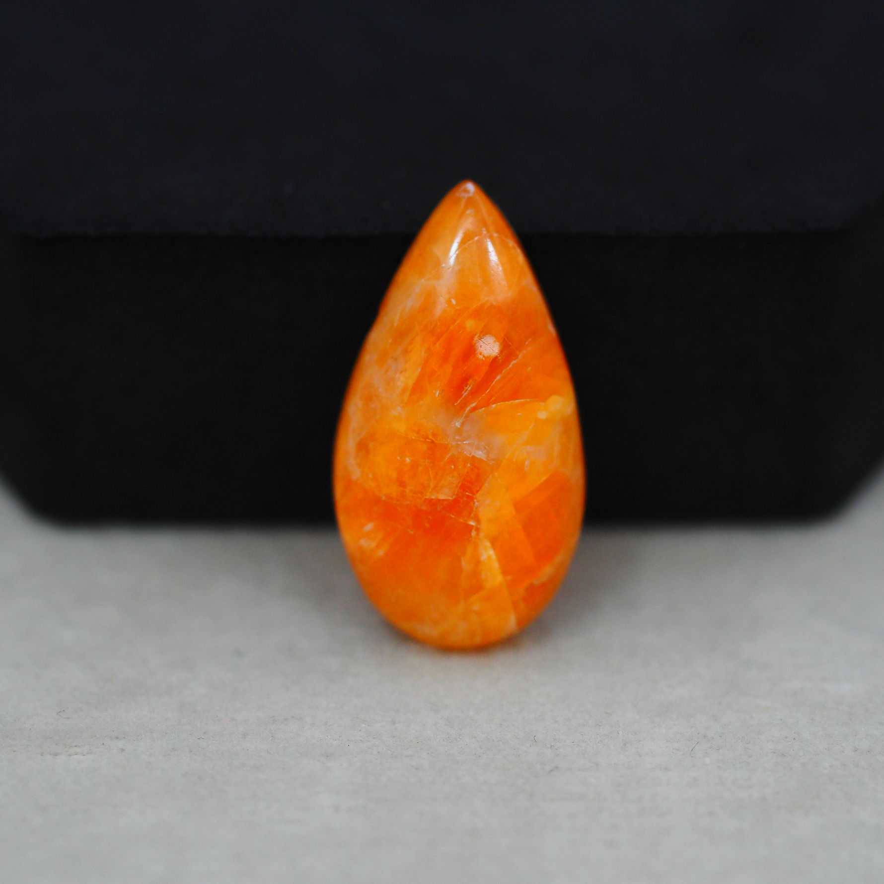 Natural Orange Calcite Pear Cabochon 26x14mm 14.5ct - warm honey-orange - Pedra Gems.